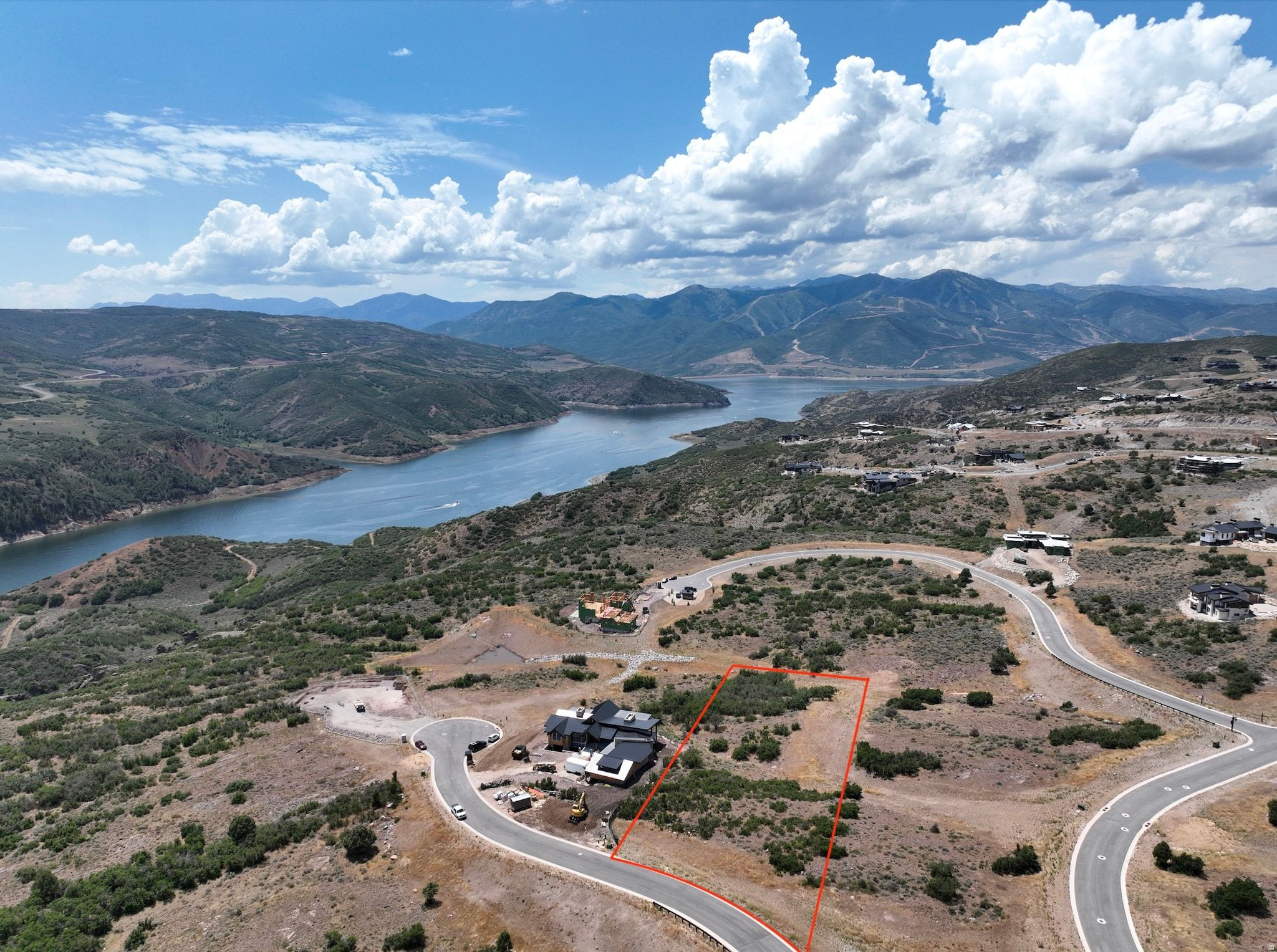Premier 1.37 acre homesite in the coveted Cougar Moon neighborhood of Tuhaye, one of Park City's most sought after private golf and lifestyle communities. This gently sloped lot offers an ideal building envelope with panoramic views of Deer Valley, Mill Canyon Peak, the new Tiger Woods golf course and the Jordanelle Reservoir, along with easy access to Tuhaye's world class amenities, including the Mark O'Meara designed golf course, private ski access to Deer Valley, tennis, pickleball, hiking and biking trails, and the newly expanded clubhouse. The Talisker Club Membership Initiation Fee, valued at $200,000, is included in the listing price, giving the future owner immediate access to this exclusive community. Located just minutes from Jordanelle Reservoir and a short drive to Park City's historic Main Street, this setting delivers the privacy and natural beauty of Kamas with the convenience of world class recreation at your doorstep. Bring your builder and create your dream mountain retreat in one of Utah's premier private communities.