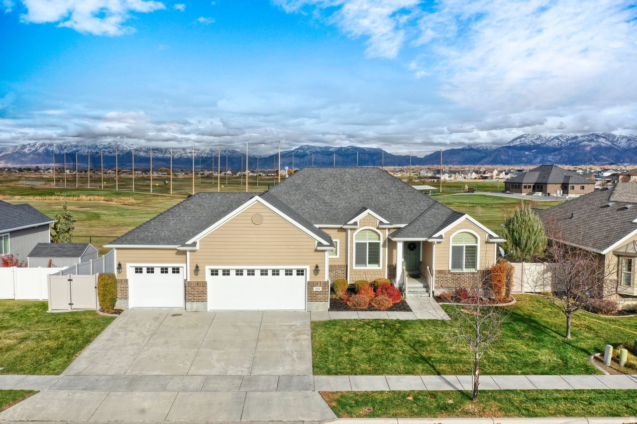Stunning Luxury Home with Mountain & Golf Course Views Discover refined living in this beautifully crafted 6-bedroom, 3-bathroom home, perfectly positioned to capture sweeping views of the Wasatch Mountains and serene vistas across the Cranefield Golf Course fairway. Built in 2010 and offering 3,232 sq ft of thoughtfully designed space, this residence blends elegance, comfort, and the ease of low-maintenance living. Step inside to find open, airy rooms with high ceilings, filling the home with light and warmth. Plantation shutters add timeless charm while offering both privacy and style. The layout includes a gracious formal dining room along with a bright, inviting breakfast nook, which opens directly to the outdoor pergola-a perfect extension of your living space for morning coffee, weekend brunches, or evening relaxation. The luxurious master suite offers a peaceful retreat featuring a separate soaking tub and shower, plus a spacious walk-in closet. Gather in the comfortable family room beside the gas fireplace, creating the ideal setting for cozy nights and meaningful moments. There is a new high-efficiency furnace, a pressure tank, and a garbage disposal all just installed this May. Outdoors, the home is fully landscaped with vibrant Daylilies, Butterfly Bushes, Calla Lilies, and Hosta's, creating a lush garden that attracts hummingbirds throughout spring and summer. And with the HOA mowing your lawn, you can enjoy the beauty without the work. Additional features you'll love: Three-car garage Main-floor laundry -surface countertops Culinary and secondary water HOA amenities, including a community pool and spa This exceptional property offers luxury living with breathtaking views, modern comforts, and effortless charm-all in a peaceful and highly desirable community. Your dream home awaits.
