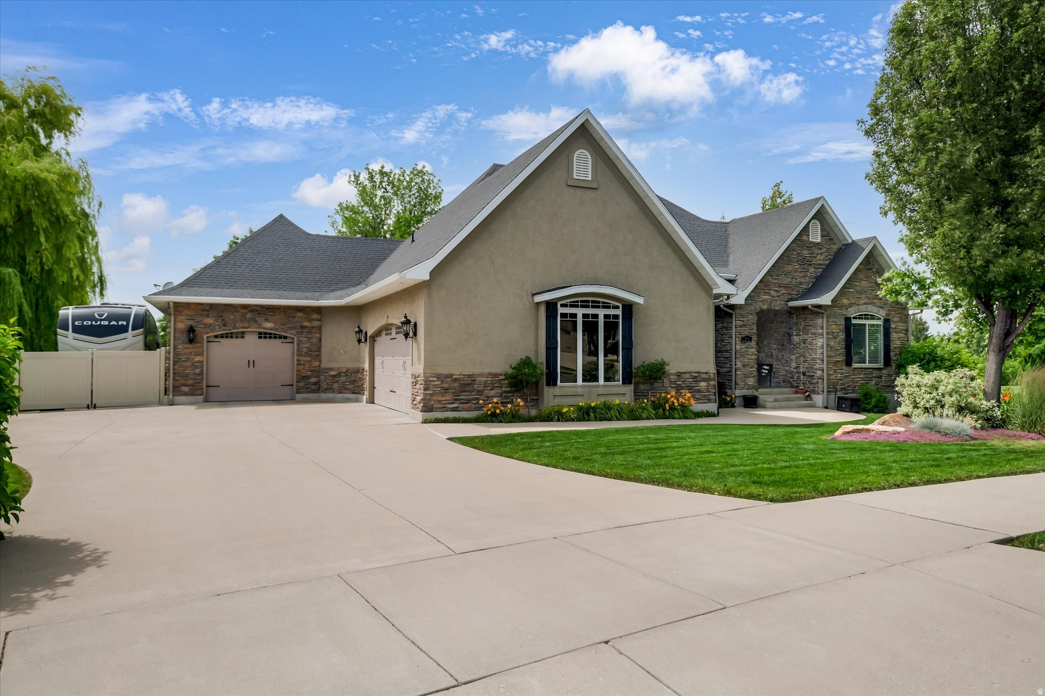 Enjoy peaceful tranquility the minute you step into this 6 bed, 3 bath home along Smithfield's Birch Creek Golf Course's 7th green! In addition to the spacious bedrooms and living rooms, this home includes custom cabinetry throughout, a large office on the main level and a flex room (currently used as the gym) in the walk out basement. With plenty of storage space all around, you will always feel organized! Outdoors, the easy to maintain landscape includes mature trees, pretty perennials and pear and honeycrisp apple trees. Along with the deck with golf course views, a large 3 car garage, RV parking and solar panels that keep the electric bill low, this is the perfect home to make your own!  Buyer to verify all information.