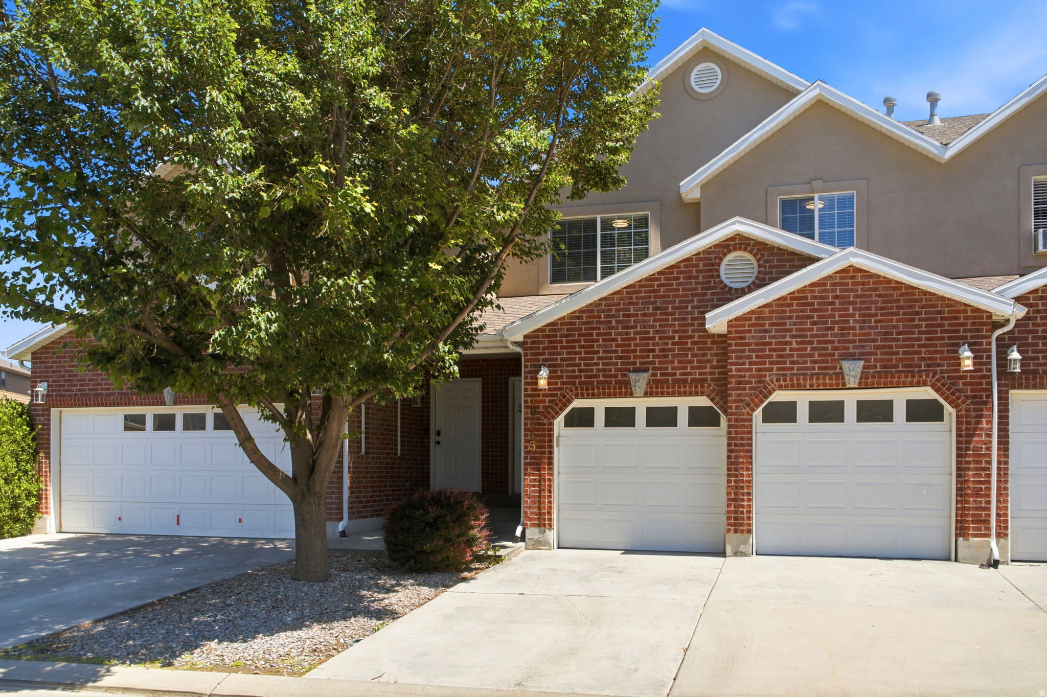 Light, bright, and move-in ready, this South Jordan townhome features one of the community's most sought-after floor plans with an airy open-concept main level, spacious kitchen with pantry, fresh paint, new carpet, and an updated primary ensuite with a walk-in closet. Ideally situated in one of the best locations within the community, enjoy nearby guest parking, open green space views, and a private deck/backyard with no immediate rear neighbors. Move in and enjoy today, while the unfinished basement provides room to grow, personalize, and add value over time. All just minutes from The District, Bangerter, parks, and trails.