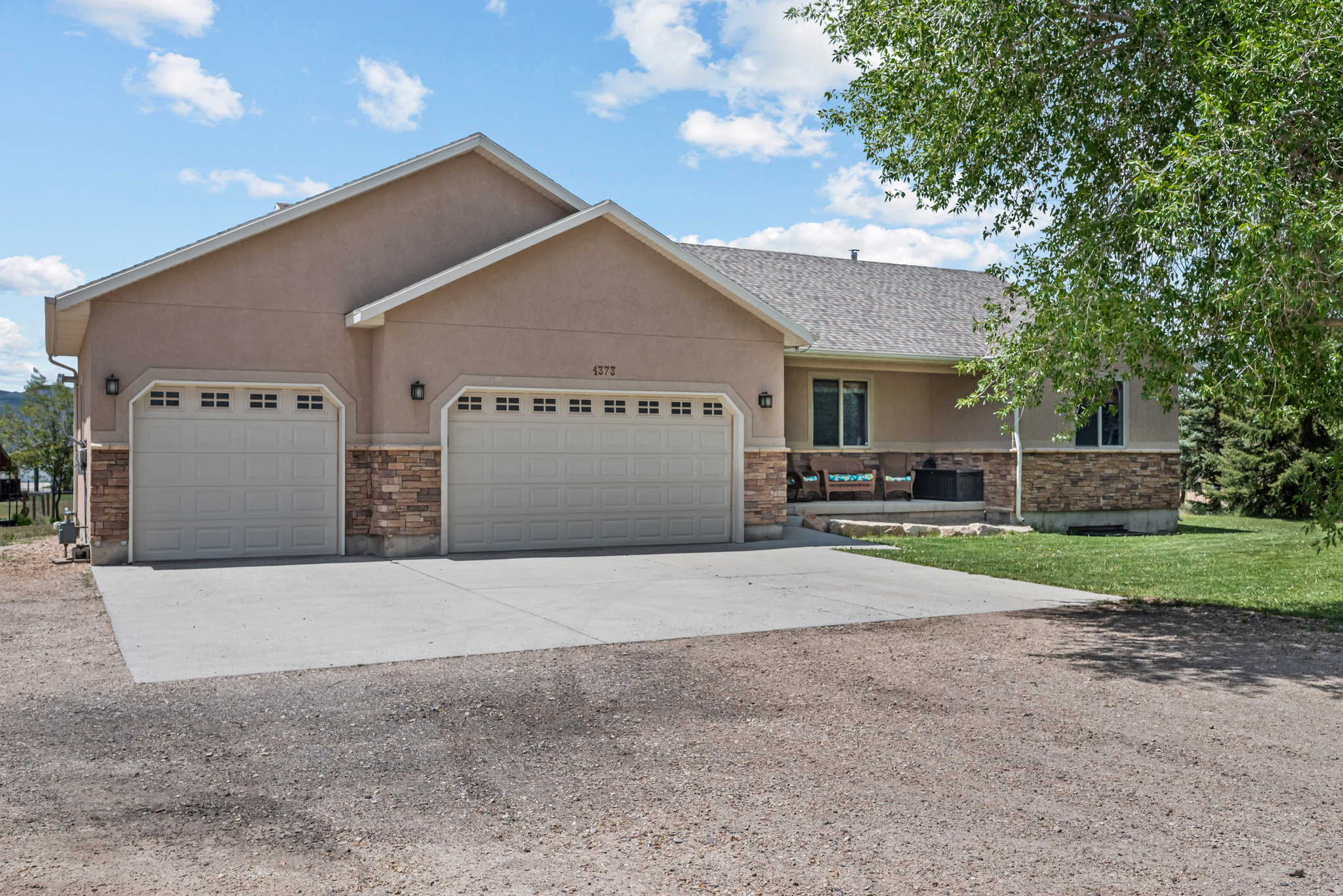 Beautiful 5-bedroom, 3.5-bath home in the heart of Oakley offering the perfect blend of small-town charm and easy access to city conveniences. This spacious home features an open floor plan with a kitchen complete with granite countertops, abundant cabinet space, and room for gathering and entertaining.  Relax in the oversized primary suite featuring a luxurious jetted tub and plenty of space to unwind. The additional bedrooms are generously sized, making them ideal for large furniture setups, guest rooms, or home offices.  The fully finished basement provides even more living space with a large family room, wet bar, 2 bedrooms, 1 bathroom, ample storage, and a second water heater for added convenience.  Step outside and take in the breathtaking mountain views and expansive yard with endless possibilities-including horse property potential. Surrounded by open skies and scenic beauty, this property offers peaceful country living while remaining close to modern amenities.  Outdoor enthusiasts will love being just minutes from the Uinta Mountains and Jordanelle Reservoir, providing year-round recreation including world-class skiing, snowmobiling, hiking, biking, horseback riding, and boating. Nearby parks and amenities include rodeo grounds, riding arena, basketball courts, pickleball courts, skatepark, softball fields, tennis courts, and extensive trail systems.  Experience the best of mountain living with fresh air, stunning scenery, and room to create your perfect retreat in one of the area's most highly desired locations. Don't miss this incredible opportunity to call Oakley home.    Square footage figures are provided as a courtesy estimate only and were obtained from previous appraisal.  Buyer is advised to obtain an independent measurement.