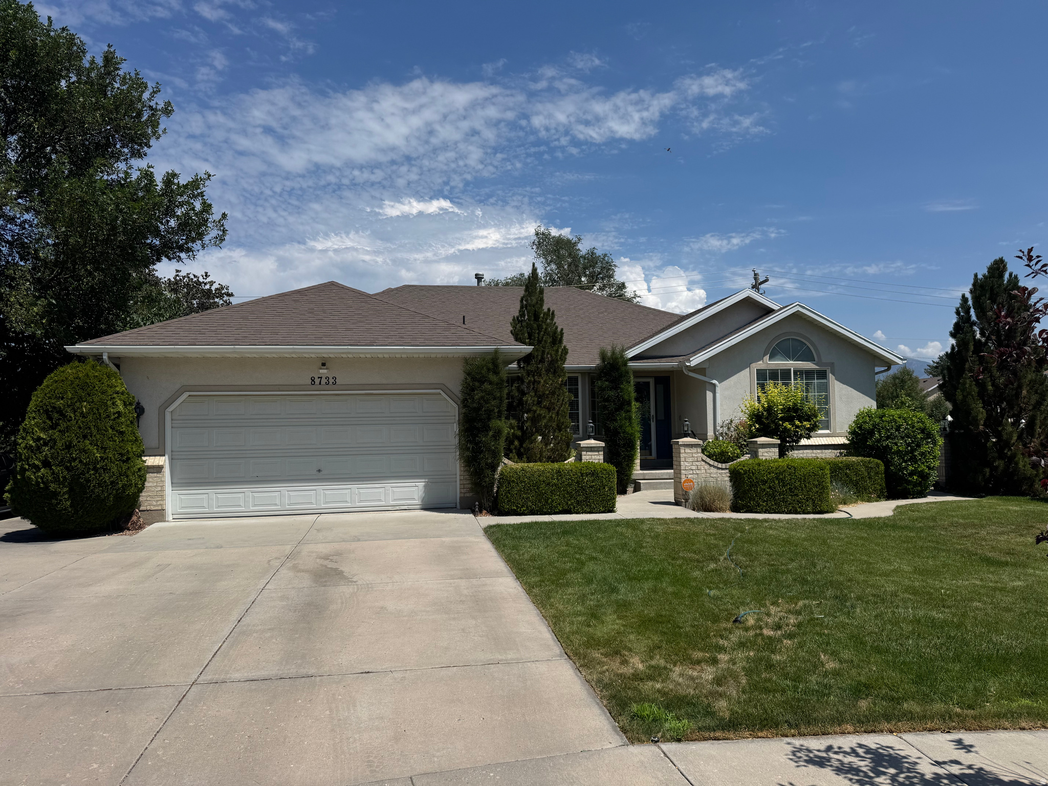 Rare West Jordan Find! Cul-de-Sac Location * Mother-in-Law Setup * No HOA * Fantastic Waterfall This spacious 5-bed, 3-bath home on 0.29 acres in the Links @ Mountain View subdivision offers the perfect blend of comfort and versatility. The main floor features bright, vaulted ceilings, single-level living, and excellent accessibility (garage lift, wheelchair access). Fresh paint and carpet on the main level.  Downstairs, a 90% finished walkout basement features a fully equipped second kitchen, making it an ideal mother-in-law apartment or guest suite. LVP flooring in the basement 2 years old and fresh paint at the same time.  Step outside to your private, secluded backyard oasis, complete with mountain views, mature fruit trees, a waterfall, a deck, and a patio. Practical extras include a 2-car garage with overhead storage, dedicated RV parking, and an outdoor shed. Superb location near schools and amenities. This one won't last long-schedule your tour today! Contact owner for showings!