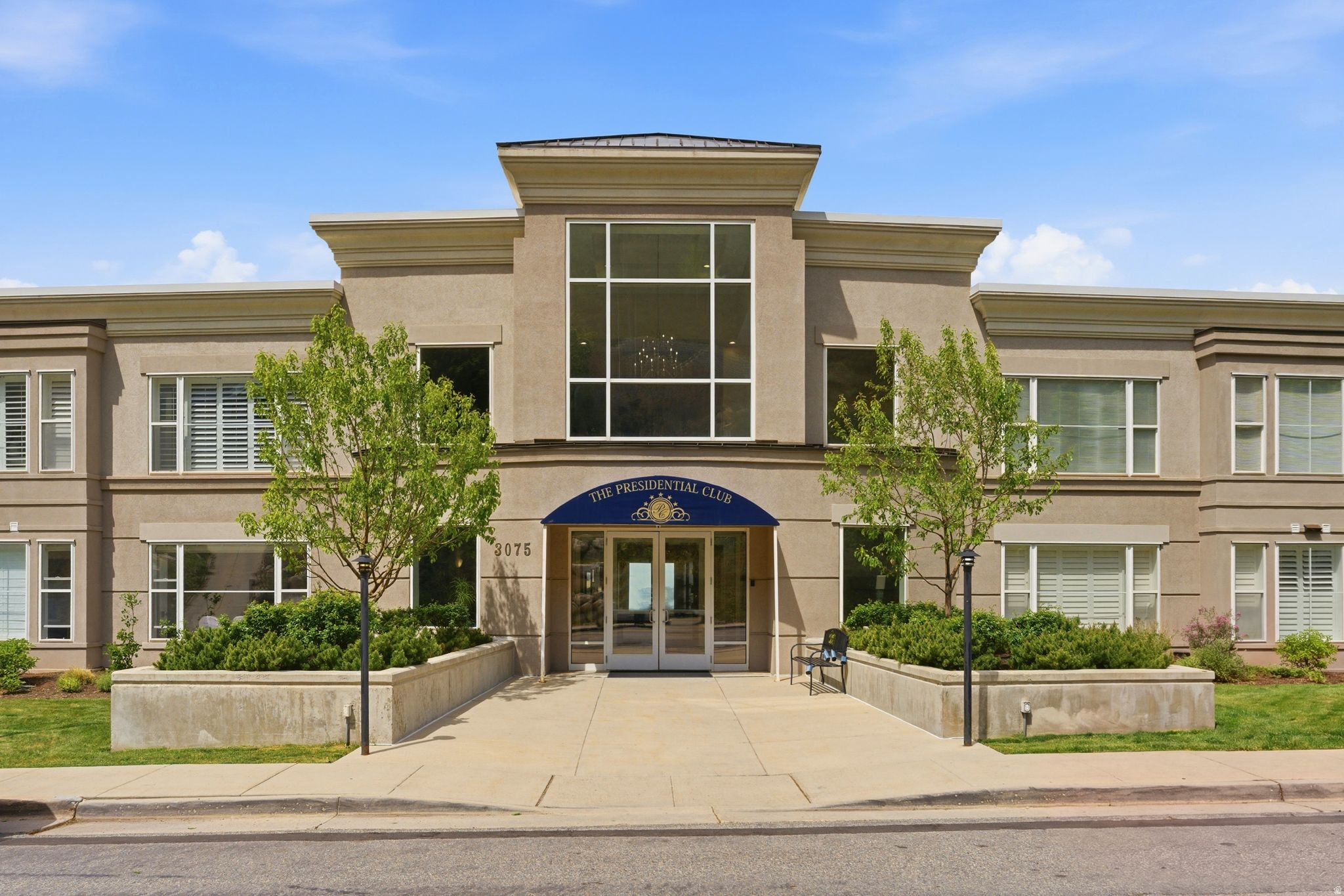 Excellent top-floor Presidential Club condo featuring a recently remodeled kitchen with custom cabinetry, roll-out shelving, under-cabinet lighting, marble countertops, farm sink and a basketweave backsplash. Hardwood floors extend through the kitchen and family room. Large east-facing windows look over the foothills and fill the condo with welcomed natural light. The spacious primary suite offers a walk-in closet and an en-suite bath with separate tub and shower. A generously sized second bedroom and full bath are conveniently located off the hallway. Impressive amenities  include a club room with dining area and kitchen, exercise room, game room, and theater. Outside a beautifully landscaped courtyard provides an outdoor retreat with a water feature, fire pit, and two BBQ areas. Two reserved parking spaces are included in a heated, secure garage featuring a car wash area, bike racks, and electric vehicle trickle-charging capability. A private storage unit is located on the P-1 level. Washer and dryer are included.  Square footage figures are provided as a courtesy estimate only.  Buyer is advised to obtain an independent measurement.