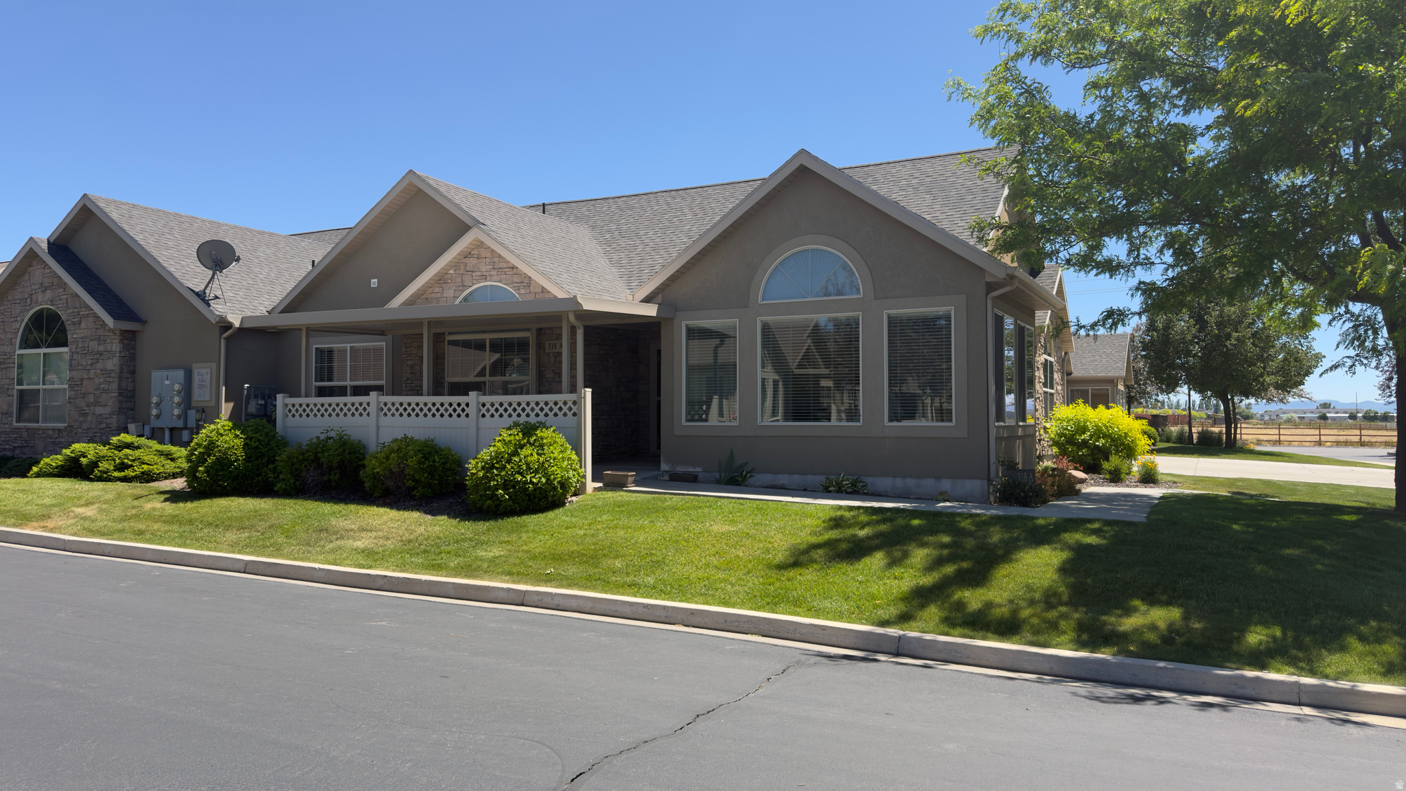 Enjoy the privacy and open views that come with one of the best locations in Towne Center Villas. This desirable corner-unit home across from open green space offers a spacious feel and unobstructed views that won't be crowded by neighboring homes. Inside, you'll find comfortable single-level living, while outside, the low-maintenance lifestyle lets you focus on what matters most. Residents enjoy access to the community clubhouse, complete with a swimming pool, workout room, and gathering spaces. Conveniently located near shopping, dining, and healthcare, this is easy living in one of North Logan's premier 55+ communities.