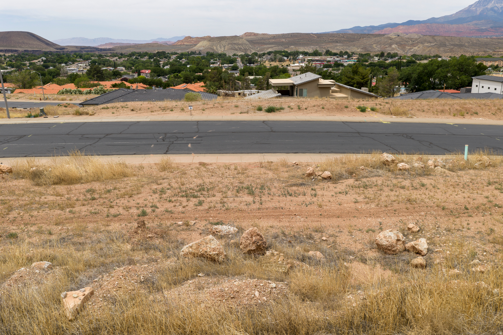Conveniently located in La Verkin this .23 acre lot is just minutes from Zion National Park. This affordable building lot provides the perfect opportunity to build in Southern Utah without the burden of HOA fees. Tucked into a relaxed neighborhood, you will enjoy sweeping views of the valley and surrounding red rock mesas without paying premium resort prices.
