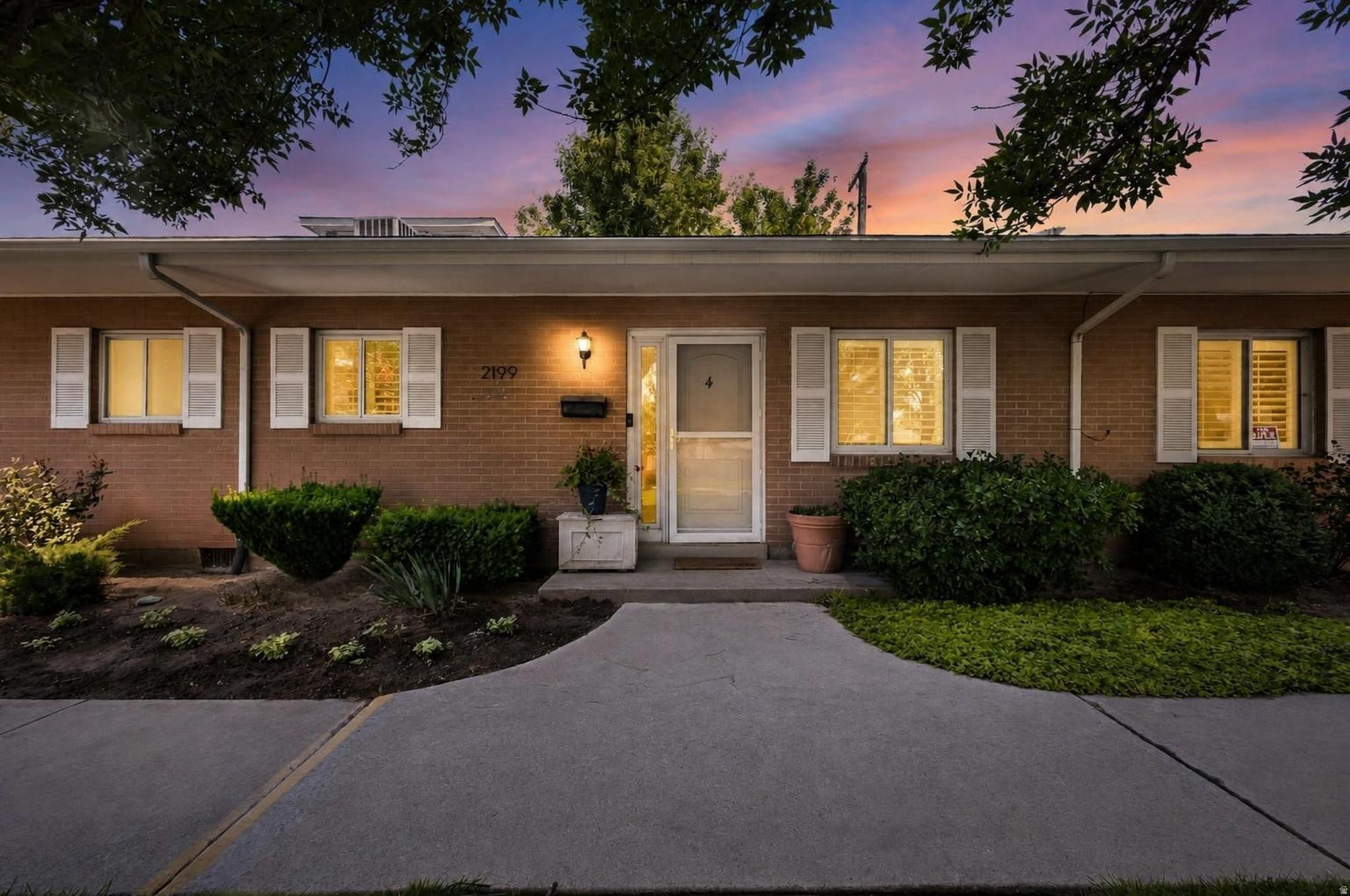 Rare opportunity to own one of only six one-bedroom condos in the highly sought-after Carriage Lane community in Holladay. One-bedroom condos with main-level living are rarely available in Holladay, and this one offers an added bonus-a private outdoor patio area in back and a large green space in front, creating an inviting outdoor setting not often found in condo living. Conveniently located with easy access to I-215, downtown Salt Lake City, Salt Lake International airport, the University of Utah, canyon recreation areas, and ski resorts. Carriage Lane Condominium HOA covers the common area expenses including the security gates, landscaping, lawn care, snow removal, trash removal, clubhouse, gym room, and outdoor swimming pool. Water, sewer and garbage expenses are also included. Exclusively designated, covered parking space and a private storage room (approx. 10 X 10 ft). Nearly next door are pickleball courts, playground, and a skatepark at Holladay City Park. Located within Driggs Elementary, Olympus Jr., and Olympus High boundaries.  Square footage figures are provided as a courtesy estimate only and were obtained from tax data.  Buyer is advised to obtain an independent measurement.