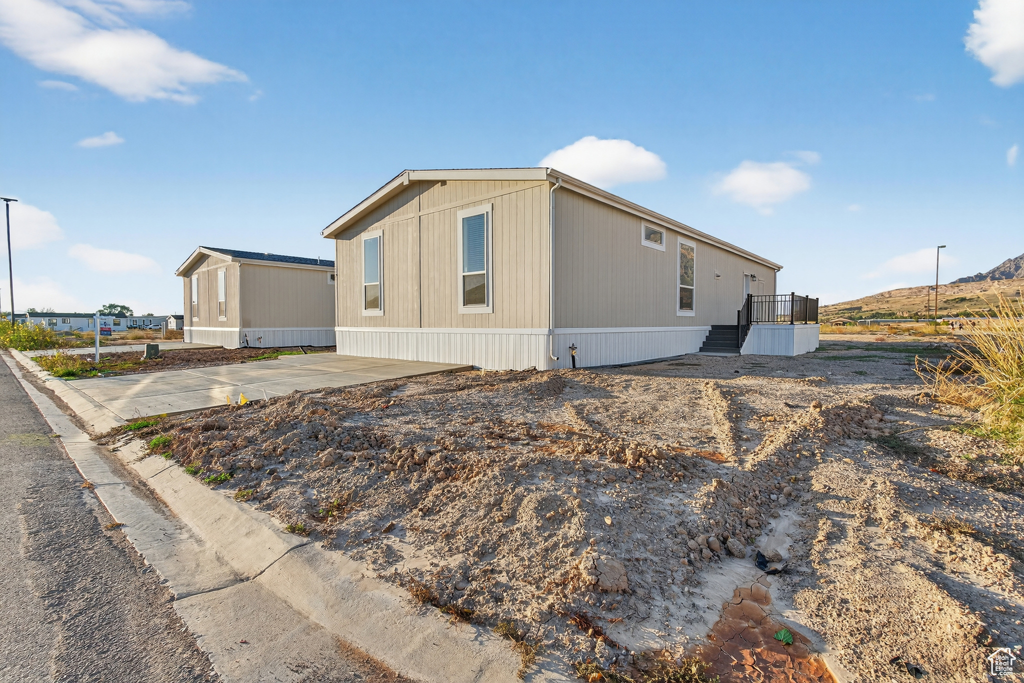 Welcome to your brand new, never-lived-in home in a beautiful new community. This 4-bedroom, 2-bathroom home combines comfort, style, and affordability, making it a great option whether you're stepping into homeownership for the first time or downsizing. The open layout features a large kitchen island, modern finishes, and an plenty of natural light that fills every room. With its thoughtful layout and high-quality details, you'd never guess it's a mobile home! Plus, with a clubhouse and pool expected to be completed in the spring, you'll enjoy even more amenities and comfort right outside your door. Don't miss the chance to own this brand new, affordable home in a growing community.