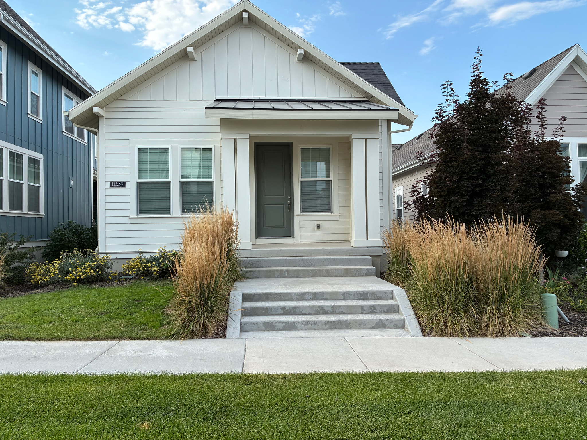 Welcome to 11539 S Bingham Rim Rd, located in the heart of South Jordan's award-winning Daybreak community! Built in 2022, this beautifully designed rambler offers the perfect blend of modern style, thoughtful design, and low-maintenance living in one of Utah's most sought-after neighborhoods.  Featuring 3 spacious bedrooms, 2.5 bathrooms, and nearly 2,000 square feet of finished living space, the open-concept floor plan is ideal for both everyday living and entertaining. The bright, modern kitchen flows seamlessly into the dining area and living room, creating an inviting space filled with natural light. The private primary suite serves as a relaxing retreat with a well-appointed ensuite bathroom, while two additional bedrooms provide flexibility for family, guests, or a home office.  The fully finished basement provides valuable additional living space, perfect for a family room, media room, home gym, playroom, or whatever best fits your lifestyle. The welcoming front courtyard offers a pleasant outdoor space to relax and entertain while enjoying a setting that's more inviting than a traditional streetscape. An attached two-car garage provides ample storage and everyday convenience.  Life in Daybreak is all about community. Enjoy outdoor concerts, holiday celebrations, movie nights, farmers markets, seasonal festivals, miles of walking and biking trails, scenic lakes, community pools, parks, a community center, and abundant open space. This home is within walking distance of neighborhood playgrounds, the scenic Watercourse, and The Cove, where residents gather for paddleboarding, lawn games, fire pits, and popular events like the Night Market and Little Italy Night.  Conveniently located near shopping, dining, schools, TRAX, movie theaters, major commuter routes, and the Ballpark at America First Square-home of the Salt Lake Bees-this move-in-ready home offers the perfect combination of comfort, convenience, and vibrant community living.  Don't miss your opportunity to own this exceptional home in Daybreak. Schedule your private showing today!