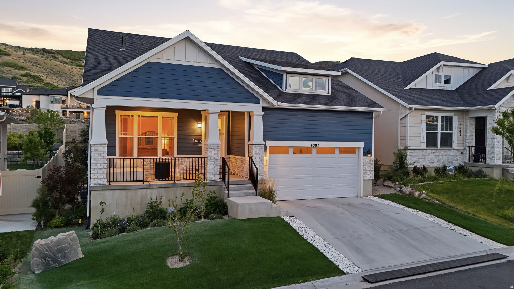 **OPEN HOUSE THIS SATURDAY JUNE 27TH 11-1PM** Perched in the Higher Elevation of Herriman and above the Salt Lake City inversion, this BEAUTIFUL home is located in the Gated Community of Juniper Bend, You'll have Access to a Clubhouse with a Pool, Hot Tub, and a Private Fitness Center Overlooking the ENTIRE VALLEY! And it's Less than a Mile from the BEST Beach in Salt Lake County at Black Ridge Reservoir and 38 minutes to Snowbird Ski Resort. If thats not enough you will have Access to HUNDREDS of miles of world-class Hiking and Equestrian Nature Trails from right Outside your Backyard. This home comes with one of the Best Spots to watch the Sunset right on Your own Front Porch. From the moment you Step Inside every detail of this home feels Welcoming and Spacious. The Tall Ceilings give it that WOW Factor!! The Home features 4 bedrooms, 3 bathrooms, and a Desirable Main-Floor Primary Suite Complete with a large bathroom designed for Relaxation. The fully finished basement has oversized bedrooms, and TONS of storage throughout, Including extra space in the garage. Windows in the home are professionally tinted, adding comfort and energy efficiency while still allowing the natural light to pour in. Step Outside to a beautifully landscaped Xeriscaped Backyard Designed for Easy maintenance and peaceful outdoor living with STUNNING views surrounding you. Located in a Gated Community with access to a Pool and Clubhouse Overlooking the Entire Valley, this home really does combine Comfort, Convenience, and Herriman Living at its Finest. SCHEDULE YOUR SHOWING TODAY!