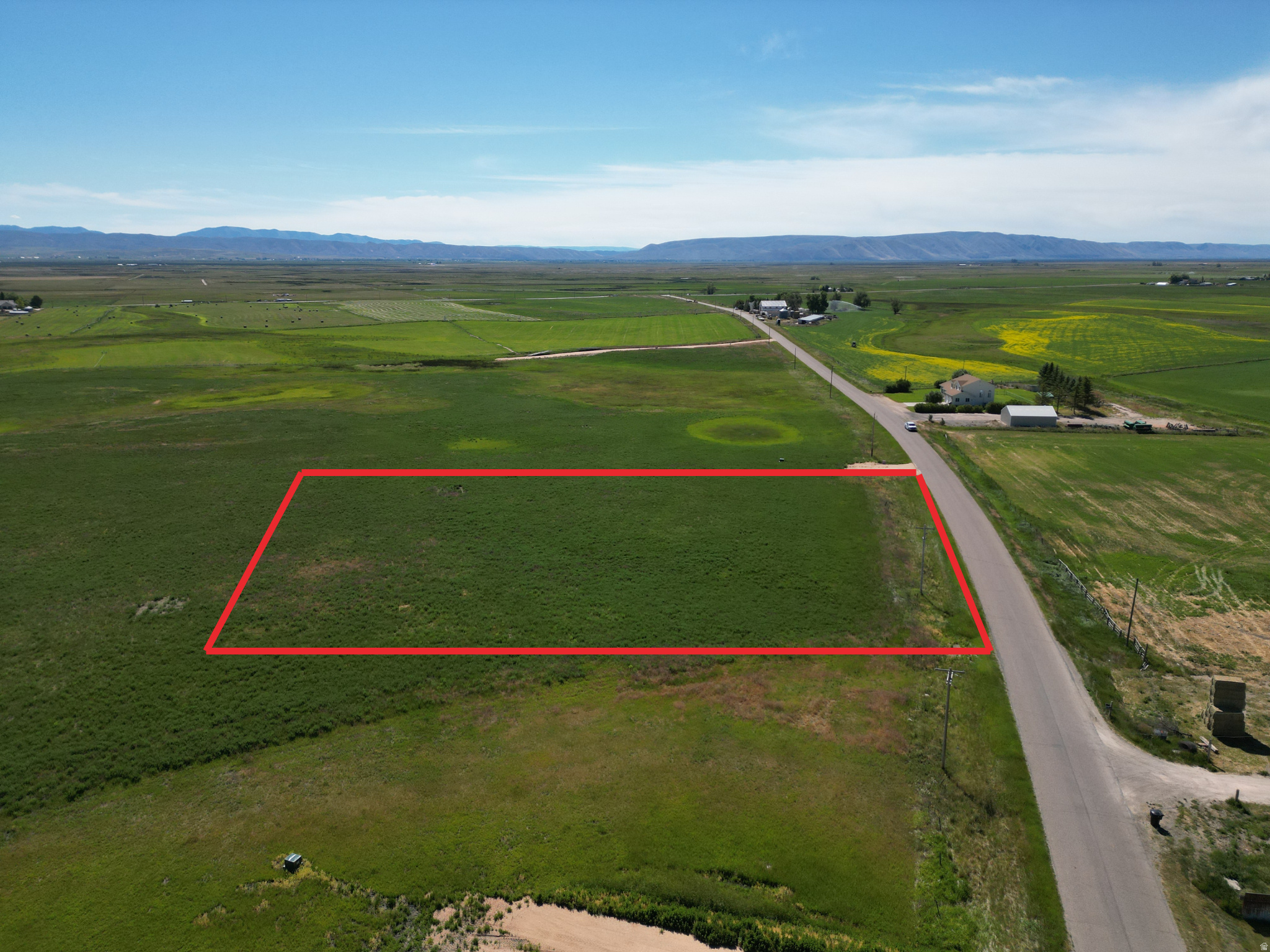 2.5 acres in Bear Lake Valley, Idaho. Nestled along quiet and rural Lanark Road, Lot 3 of Baer Acre Farms offers flat, usable land in one of Southeast Idaho's most sought-after recreational areas. Enjoy the perfect balance of privacy and convenience - just 5 minutes to both Paris and Montpelier for shopping, dining, schools, and everyday errands, while still feeling tucked away from the hustle and bustle. This spacious parcel is ready for your vision with an improved approach already completed, power stubbed to the lot, and fiber optic conduit installed. Whether you're dreaming of a year-round residence, vacation getaway, hobby farm, or private retreat, this property provides the flexibility and space to make it happen. Outdoor enthusiasts will love the unmatched location. Only 10 minutes Mill Canyon to access National Forest. Just 15 minutes from Bear Lake's famous North Beach and only 25 minutes to Garden City, you'll have quick access to boating, fishing, ATV trails, snowmobiling, hiking, and endless year-round recreation.