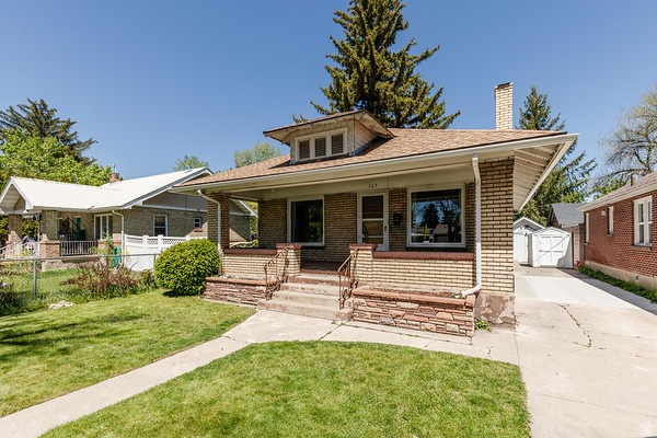 Charming and full of character, this centrally located Logan home offers timeless appeal at an incredible value! From the tall ceilings and beautiful built-ins to the large mantle, cozy brick fireplace, and wood-burning stove, this home has the warmth and charm buyers are looking for. Enjoy relaxing on the spacious front patio or entertaining in the private, secluded backyard. Conveniently located on 200 North, this property offers quick and convenient access in and out of Cache Valley while still being close to shopping, restaurants, schools, and parks. The basement offers additional usable square footage with room for another bedroom, plus plumbing and a half bathroom already started-providing great potential for added value. Recent updates include a newer roof and new main water line for added peace of mind. The detached shed/shop provides excellent extra storage and workspace. At this price point, this is one of the best values currently on the market in Logan. Homes with this much charm, space, and potential do not come along often-this one won't last! Square footage figures are provided as a courtesy estimate only and were obtained from county records + self measurement, buyer to verify all.