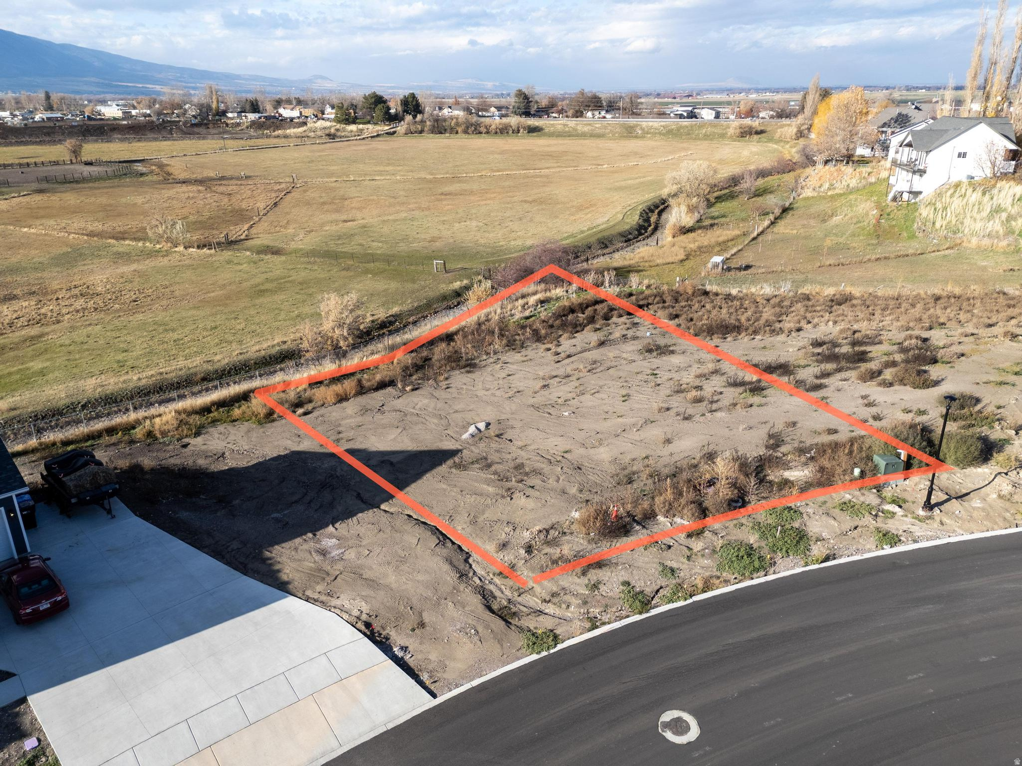 Beautiful Location with fantastic views from the large lot. Bring your own builder and build on this one of a kind homesite. Pressurized irrigation is provided by Hyrum City and is an inexpensive way to keep your yard looking beautiful and green with an affordable water supply.