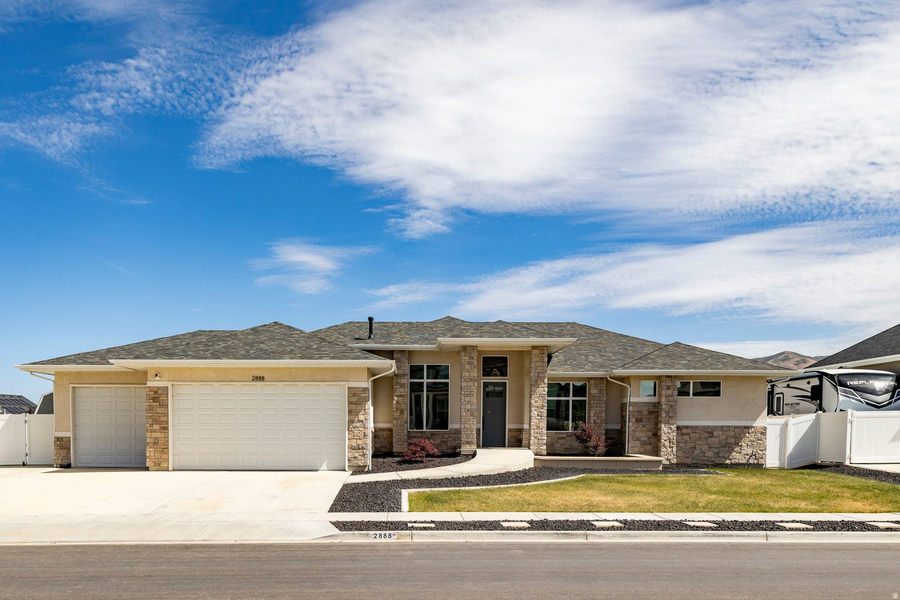 Experience exceptional comfort, accessibility, and craftsmanship in this custom-built Symphony home, ideally located in one of Lehi's most desirable neighborhoods. Thoughtfully designed for true main-floor living, this beautifully maintained residence combines quality construction with custom ADA features rarely found in today's market, including a ramp to the front entrance, garage access ramp, grab bars, and a roll-in shower.  The spacious floor plan features 4 bedrooms, 3 bathrooms, a dedicated home office with custom cabinetry, formal living and dining spaces, and a grand primary suite designed as a private retreat. At the heart of the home, the gourmet kitchen offers abundant workspace, quality finishes, and an inviting gathering place for everyday living and entertaining. Thoughtful upgrades include a pebble ice machine and reverse osmosis (RO) water systems serving both the kitchen and primary bathroom.  Additional features include a dedicated RV parking pad and a built-in radon mitigation system, providing added convenience and peace of mind.  Step outside and enjoy the nearby Jordan River Trail system, with miles of scenic walking, running, and biking paths just moments from your doorstep. Residents also enjoy access to a community pool, providing the perfect place to relax, cool off, and connect with neighbors during the warmer months. Conveniently located near shopping, dining, recreation, and Utah's thriving Silicon Slopes technology corridor, this home offers the perfect balance of accessibility, convenience, and lifestyle.  Whether you're seeking single-level living, enhanced accessibility, or simply a beautifully crafted custom home in a premier Lehi location, this property presents a rare opportunity to enjoy it all.