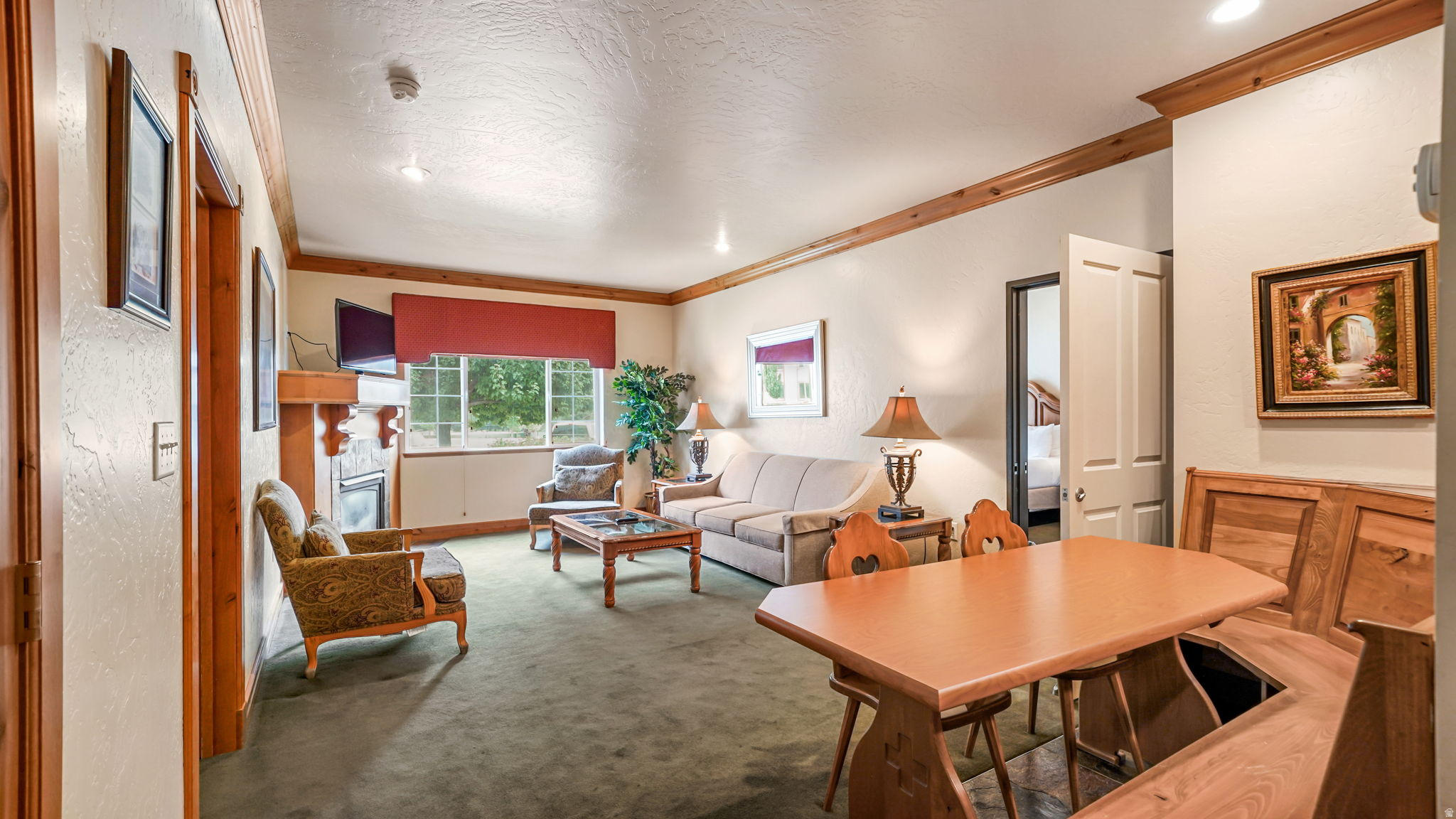 Experience the perfect blend of mountain retreat, investment opportunity, and resort living in this versatile 2-bedroom villa at the renowned Zermatt Utah Resort & Spa. Designed with flexibility in mind, this lock-off floor plan allows you to enjoy the entire villa as one spacious residence or maximize rental potential by using the units separately. The main villa features a spacious primary suite with French doors opening to a private walkout patio, a full kitchen, inviting living room with fireplace, and a luxurious ensuite bath. An adjoining second suite offers two beds and a private bathroom, creating the perfect setup for guests, family, or separate nightly rentals. Whether you're looking for a personal mountain getaway, an income-producing investment, or both, this property offers exceptional versatility. Owners and guests enjoy access to outstanding resort amenities including indoor and outdoor swimming pools connected by a unique swim-through passage, an expansive fitness center, spa services, restaurants, boutique shopping, mini golf, sports courts, beautifully landscaped grounds, an outdoor carousel, and inviting gathering spaces throughout the resort. Located in the heart of Midway, you're just minutes from world-class golf, blue-ribbon fishing, hiking and biking trails, boating on the Jordanelle, and skiing at Deer Valley and Park City. This is resort living with the flexibility to enjoy, rent, or do both.  Square footage figures are provided as a courtesy estimate only and were obtained from tax records.  Buyer is advised to obtain an independent measurement.