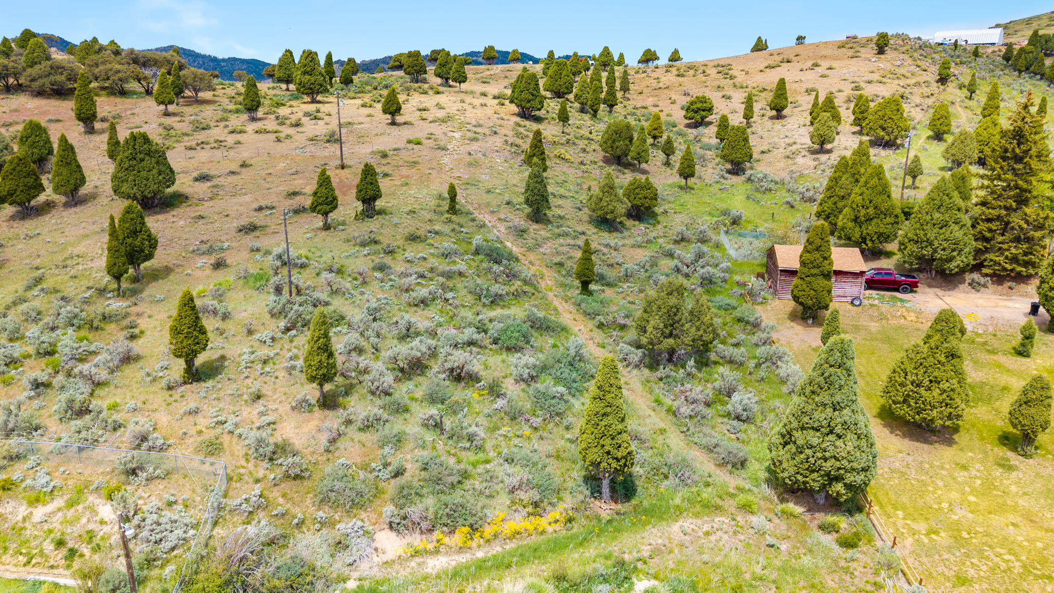 .83 acres just outside Soda Springs with livestock permitted. This is usable ground with natural slope and contour. It lays the way this valley lays, giving it character and good drainage. Set up for a small barn, a few animals, or keep it simple and build when you are ready. There is enough ground here to make it practical without taking on more than you want to manage. Close to town for feed, fuel, and groceries, but far enough out to feel rural.