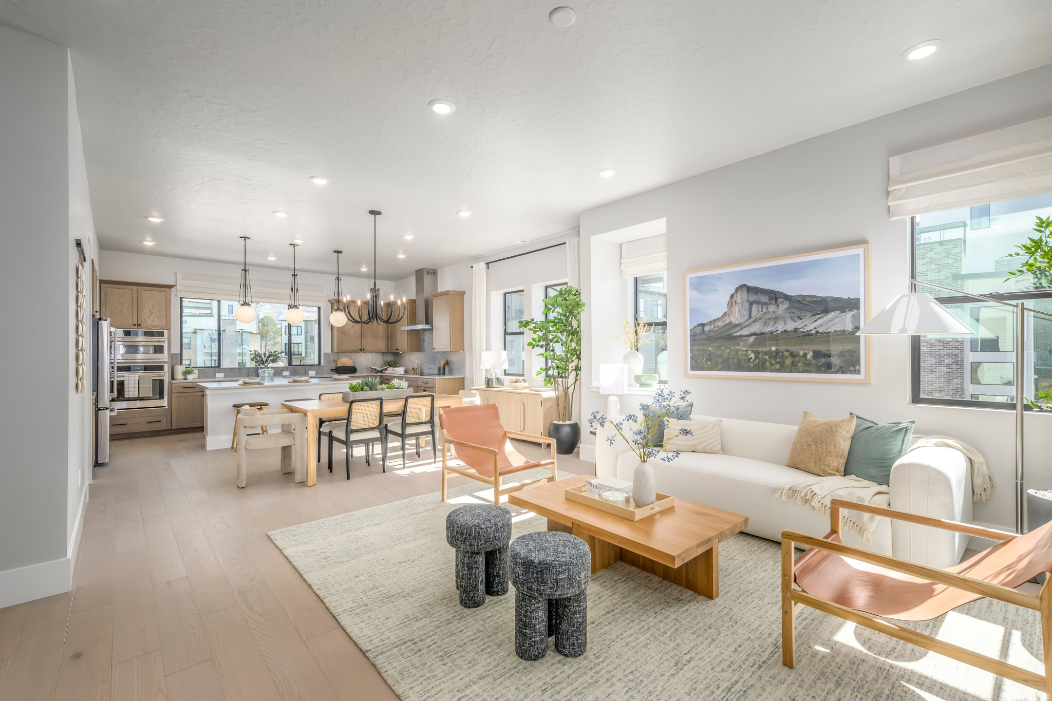 Striking architecture and modern livability come together in this refined brownstone at Aspire at Holladay Hills. Designed with intention and filled with natural light, the home blends elevated style with everyday ease. The main level welcomes you with soaring 10-foot ceilings and expansive living spaces ideal for gathering and entertaining. A chef-inspired kitchen features a walkin pantry and a convenient home management center, flowing effortlessly into the dining area and great room. Wide stairways enhance the open feel, while covered outdoor living extends your space for year-round enjoyment. Upstairs, three generously sized bedrooms provide comfort and privacy. The primary suite is a true retreat, highlighted by impressive 11.5-foot ceilings and a spa-like bath with dual vanities. The secondary bath also offers dual vanities-an uncommon and highly functional feature that adds everyday convenience. This home is ready to be personalized at the design center. Built by Tri Pointe Homes, Aspire at Holladay Hills presents 57 luxury brownstone-style residences within one of Holladay's most dynamic new walkable communities. Located on the iconic former Cottonwood Mall site, residents enjoy effortless access to boutique shopping, dining, co-working spaces, and stunning Mount Olympus views. With Salt Lake International Airport just 20 minutes away and worldclass skiing in the Wasatch Mountains within 25 minutes, this is urban sophistication perfectly positioned for adventure. Square footage figures are provided as a courtesy estimate only and were obtained from Builder. Buyer is advised to obtain an independent measurement.