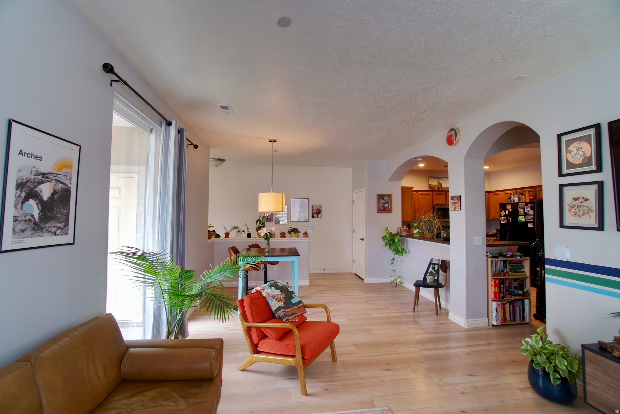 Welcome to this well appointed condo in the heart of Lehi, right in the middle of Silicon Slopes where location actually matters. Step out onto your private balcony and take in sweeping views of the Wasatch Mountains, perfect for a quiet morning or winding down at the end of the day. Inside, the layout just works. New flooring installed just four years ago gives the space a clean, updated feel without the hassle of immediate upgrades. The primary suite stands out. The bathroom is oversized and thoughtfully designed with dual sinks, two closets, a private toilet room, and both a separate tub and shower. There is plenty of space to spread out without stepping on each other's toes. The HOA includes access to a pool and workout room, adding real lifestyle value without leaving the community. Location ties it all together. You are minutes from tech hubs, shopping, dining, and freeway access, making this a smart move whether you are commuting or investing.