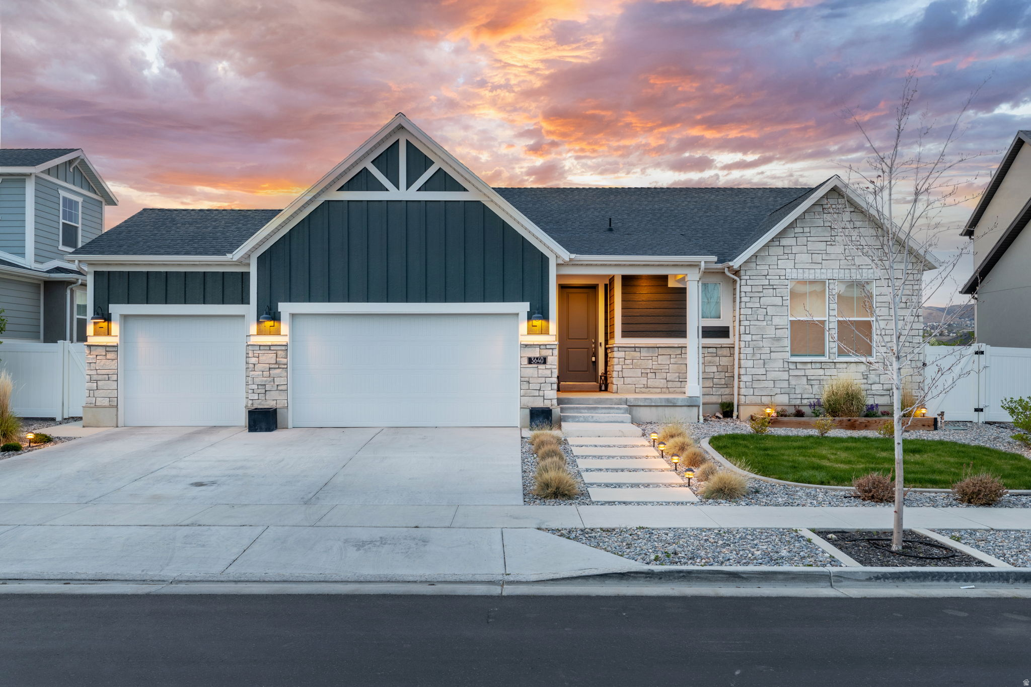 Most homes at this price are builder-grade. This one isn't. This 2022 Holbrook Farms rambler has been meaningfully upgraded: custom cabinetry, designer hardware and pulls, a statement backsplash, and curated lighting throughout the kitchen. Both bathrooms were redone with custom tile, glass details, and elevated finishes. The primary suite features 9-foot ceilings and an oversized custom closet. The fully finished basement is open, bright, and flexible. Outside, the backyard is fully fenced and built for entertaining - programmable landscape and eave lighting, a fire pit (with gas stub) ready for connection, garden beds on culinary water, and a xeriscaped front yard that stays sharp year-round with zero effort. Holbrook Farms is one of Lehi's most established communities, with a neighborhood park, mature streetscapes, and unmatched access: Primary Children's Hospital, Thanksgiving Point, outlet shopping, and the mouth of American Fork Canyon - with Timpanogos Cave, rock climbing, and the Timpooneke Trail all minutes away. The coming 2100 North freeway connection and planned Jordan River Trail bike path only add to the long-term appeal. Six bedrooms at this finish level, in this neighborhood, rarely comes to market. Square footage is an estimate from county records; buyer to verify.