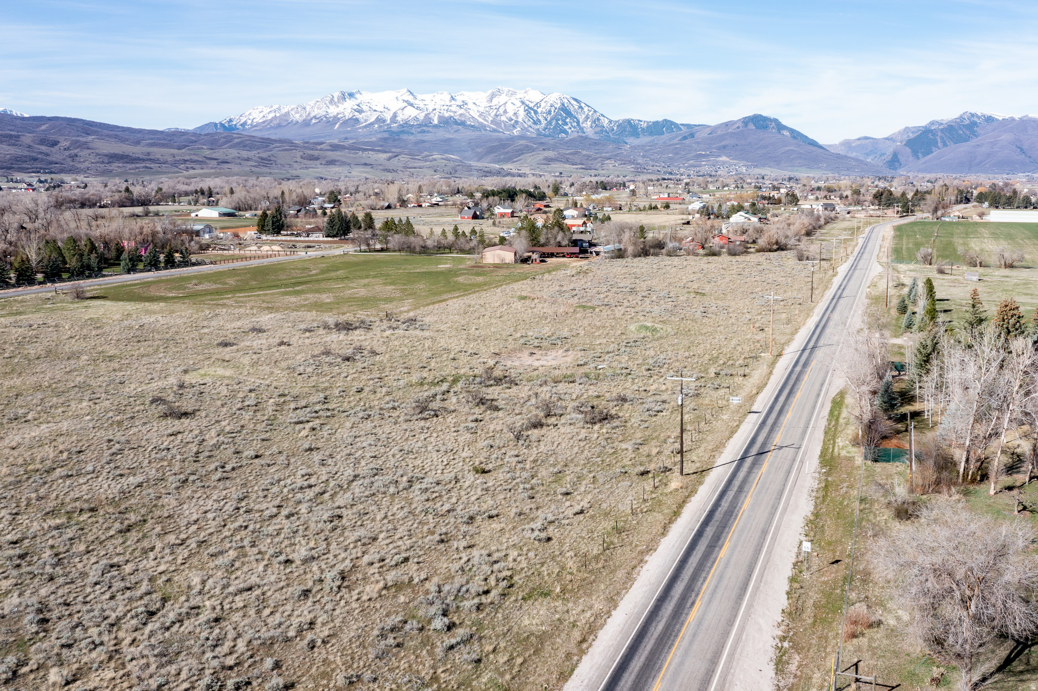 NINE Acre shares of water (recently valued at $12,000 each) Perfect opportunity to build your dream home in the Ogden Valley! This build-ready 5.12 Acre parcel offers strong upside with utilities already in place, including natural gas, and a completely set up culinary well. Property has had PERC test and is approved for septic. Located minutes from Pineview Reservoir and within  30 minutes to Ogden, 60 minutes of Salt Lake City. Outdoor paradise with access to 3 ski resorts, Fishing, boating, and an endless supply of hiking / biking trails. Ideal for a custom build, vacation property, or long-term hold, this lot combines usability, location, and lifestyle appeal.