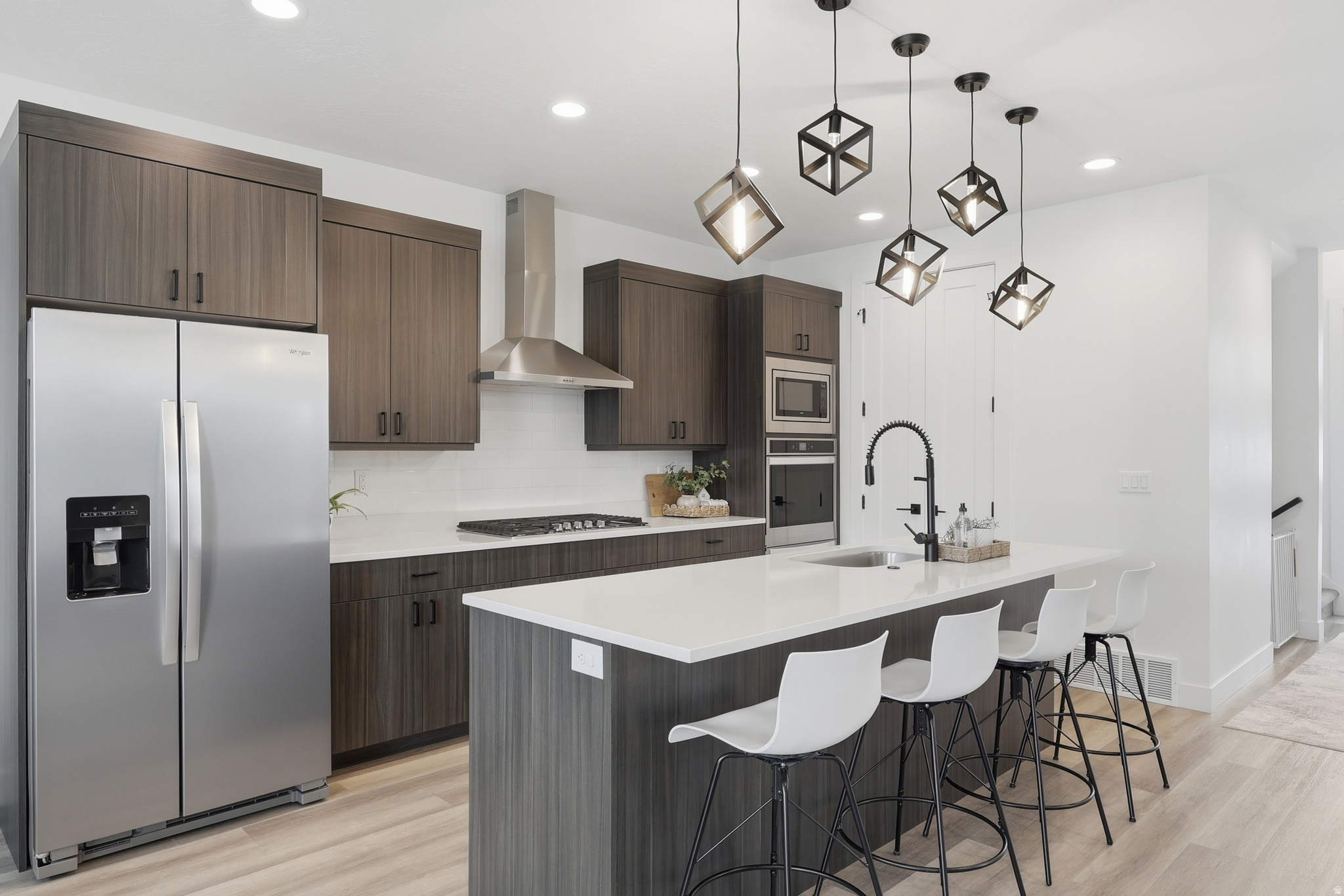 **Preferred LENDER incentive: 1 year interest rate Buy Down included.** Experience elevated living in this nearly new Modern home, with mountain views and nestled on a peaceful cul-de-sac in the highly desirable Murray / Millcreek area. Featuring 6 spacious bedrooms, 5 bathrooms, an oversized loft / family room, a massive west facing balcony, a dedicated main-floor office space and a finished basement with 2nd kitchen. This home offers exceptional flexibility for multigenerational living, guests or potential income generating spaces. For Buyers seeking an independent basement set-up, a walkout/separate entrance may be added for ~$15K. Murray allows short-tern rentals in owner occupied spaces, and this home has the perfect set-up. All appliances are negotiable. The home is centrally located, minutes from the main Intermountain Hospital Campus, Fashion Place Mall, entertainment and eateries, while remaining 15 minutes from world-class canyons and mountains for your favorite outdoor adventure.  Seller Financing is available, call about terms.