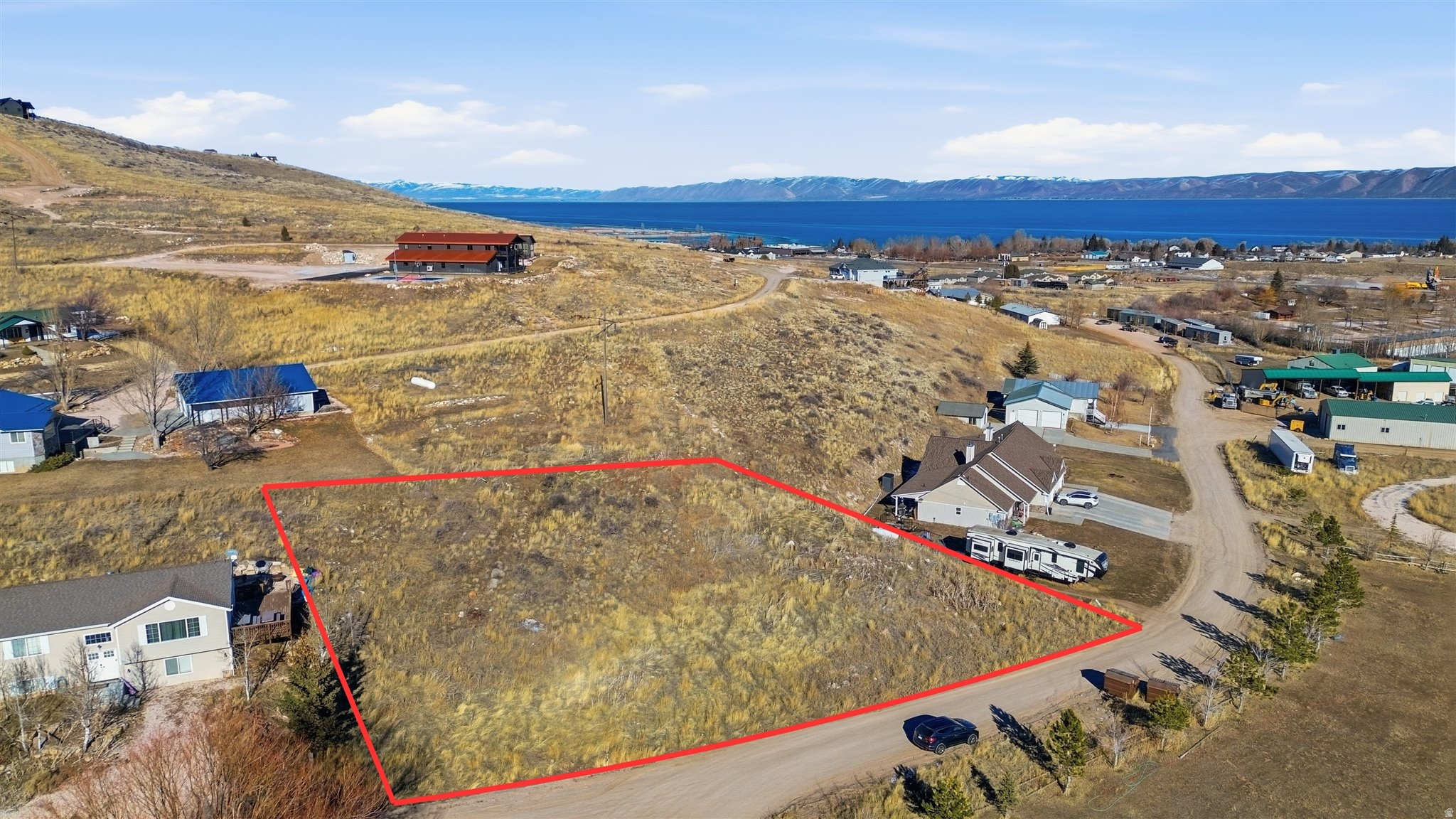 .55-acre building lot with views of Bear Lake. Plenty of space whether you're envisioning a cozy getaway cabin or a stunning vacation home, this lot allows for short-term rentals, making it a smart investment and a dreamy escape. Water and power are stubbed. Lot lines are approximate. All information is deemed reliable, buyer to verify.