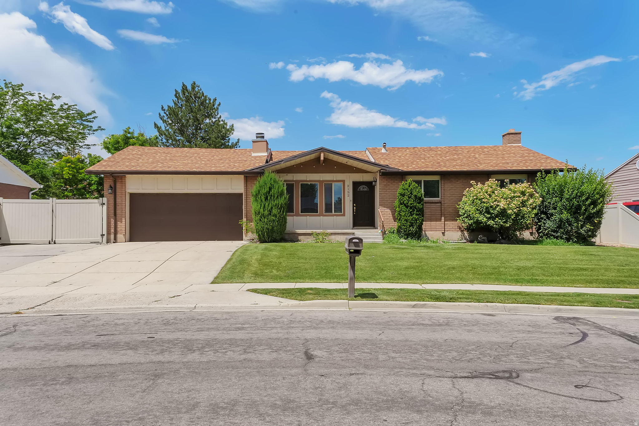 Don't miss this 5-bedroom, 3-bath home, located in a well-established Riverton neighborhood. Situated on a generous 0.23-acre lot, this home offers a functional floor plan, generous living spaces, and endless potential to make it your own. The main level  features a functional kitchen with ample cabinet space, 3 bedrooms and 2 bathrooms along with a living room and a family room. The lower level offers a large functional space that can also be used as an ADU, with a private exterior entrance. The basement has two additional bedrooms, a full bathroom, and plenty of laundry and storage space. Outside, you'll appreciate the mature shade trees, storage shed, and rare extra-long RV parking with plenty of room for recreational vehicles, trailers, or additional parking. Located in a desirable, established neighborhood close to parks, schools, shopping, and everyday conveniences, this home offers a wonderful opportunity for buyers looking for space, functionality, and the chance to add their own personal style. Come see the possibilities for yourself!