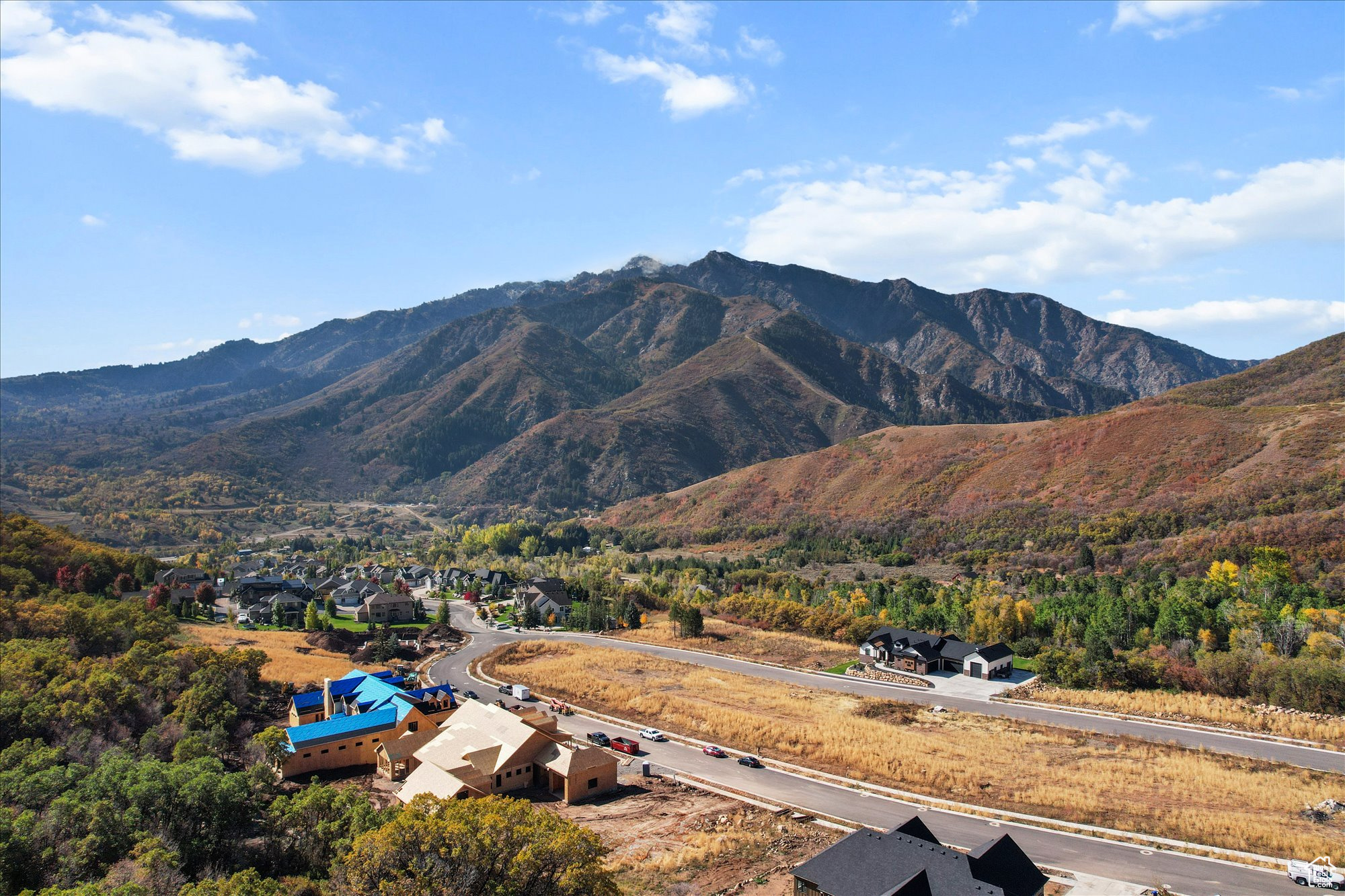 An Extraordinary Setting for Your Dream Home! Rare opportunity to build your dream home in one of Mountain Green's most exclusive neighborhoods. This expansive .92-acre lot captures sweeping views of the Wasatch Back, offering a sense of serenity and space that's hard to find. With no backyard neighbors, you'll enjoy the luxury of privacy and the beauty of nature right at your doorstep.  Located just minutes from Snowbasin Resort, Pineview Reservoir, and the charming communities of Ogden and Layton, this property perfectly blends mountain tranquility with everyday convenience. Salt Lake City International Airport and downtown are both under 40 minutes away, making it easy to stay connected while enjoying the peaceful pace of mountain life.  This is your chance to build your dream home in a dream location, where nature, comfort, and convenience all come together.