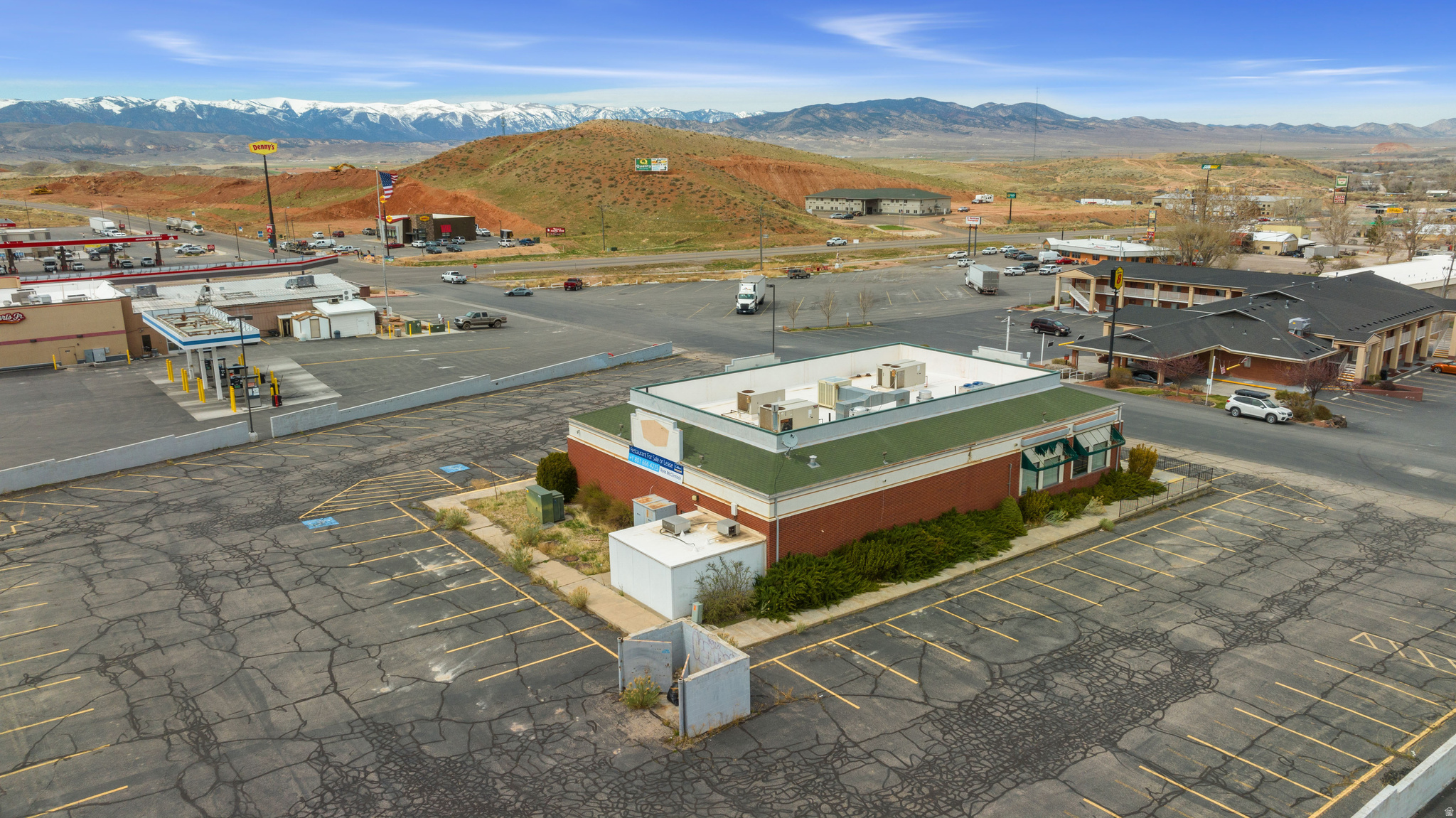 Calling all restaurateurs! This former Denny's restaurant has tons of potential! Great visibility and traffic right off of I-70 and Hwy 89. The 1.5 acre paved lot has nearly 100 parking stalls and adjacent semi-truck parking. It's located right next to a Super 8 motel, Phillips 66, Maverick, and Peterbilt. Fully-equipped kitchen with all equipment included. Two 8'x15' walk-in freezer/coolers. Spacious foyer/waiting area and tons of restaurant seating. Latest tenant was "Roy's Pizza". This diner is just begging to be revitalized - come see it for yourself today!