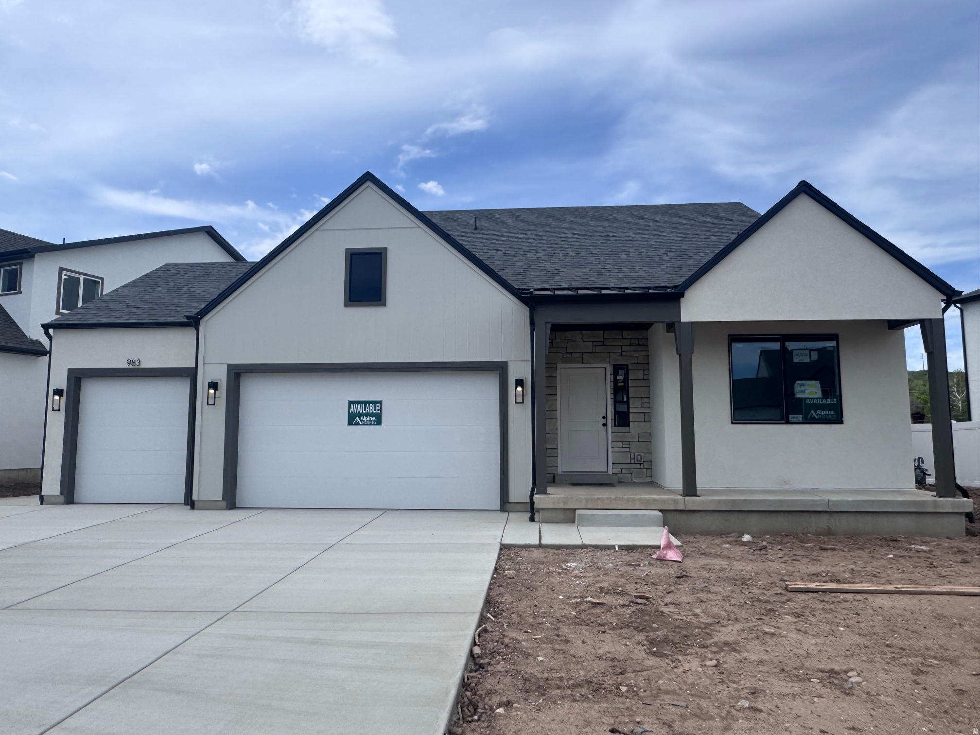 DREAM HOME, DREAM LOCATION. Ask about our rate-buy-down incentives! Perfectly situated within 5 minutes of Schneiter's Riverside Golf Course, the Riverdale Family shopping center, and the I-15/I-84 corridor. This stunning Summit plan features a 3-car garage with an RV pad. The open-concept main floor is designed for modern living, boasting a home office with double glass doors and a chef's kitchen featuring quartz countertops, stainless steel appliances, and soft-close cabinetry. A functional mudroom and walk-in pantry keep the home organized and clutter-free. With 5 spacious bedrooms and 4 bathrooms, there is room to grow. The primary suite offers a spa-like retreat with a deep soaker tub and separate walk-in shower. The fully finished basement features a private walk-out 2-bedroom ADU apartment-perfect for guests or rental income. This Parade of Homes-caliber property is built for entertaining! Call today to schedule your private tour. MODEL HOME: 1037 W Motor Vu Drive, Riverdale, UT 84405