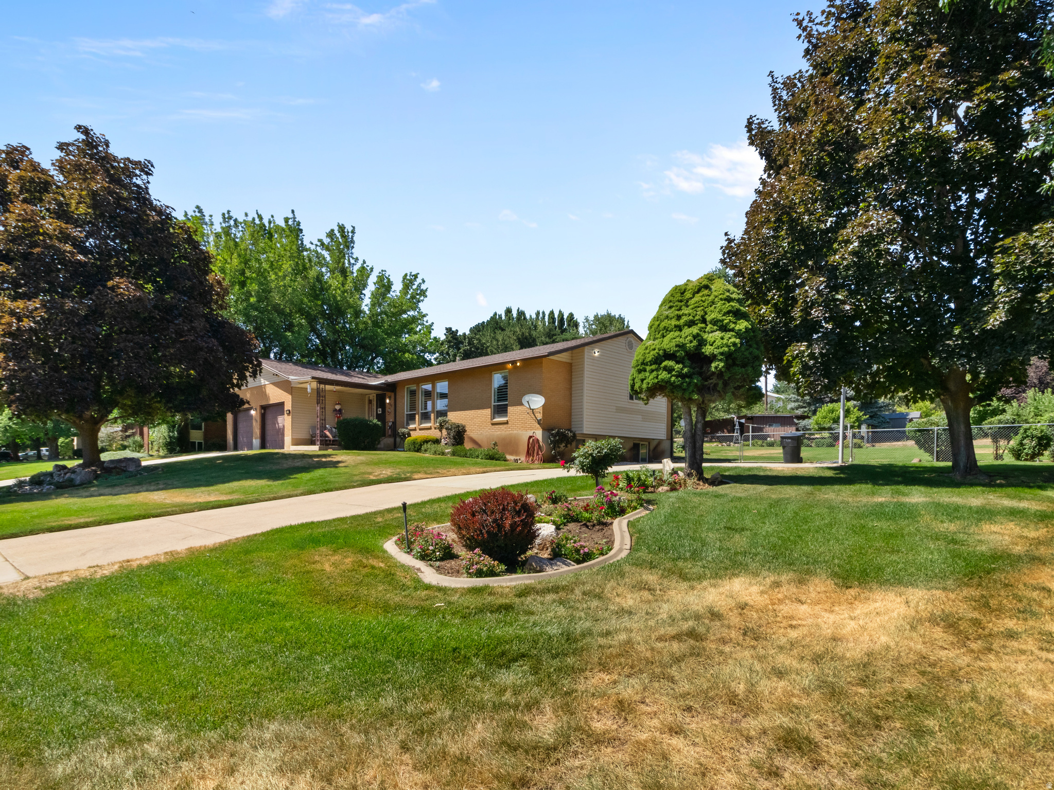 Pleasant View 1 family owned and loved for 50 yrs this rambler has 5 bed 3 bath with beautiful enviable yard. 3 apple,2 peach. 1 nectarine veg garden lots of lawn to play, plus covered patio to relax. New water heater 2026, new furnace and central air 2025.  RV pad or extra parking on side of house.  Square footage figures are provided as a courtesy estimate only and were obtained from ____county__________ .  Buyer is advised to obtain an independent measurement.