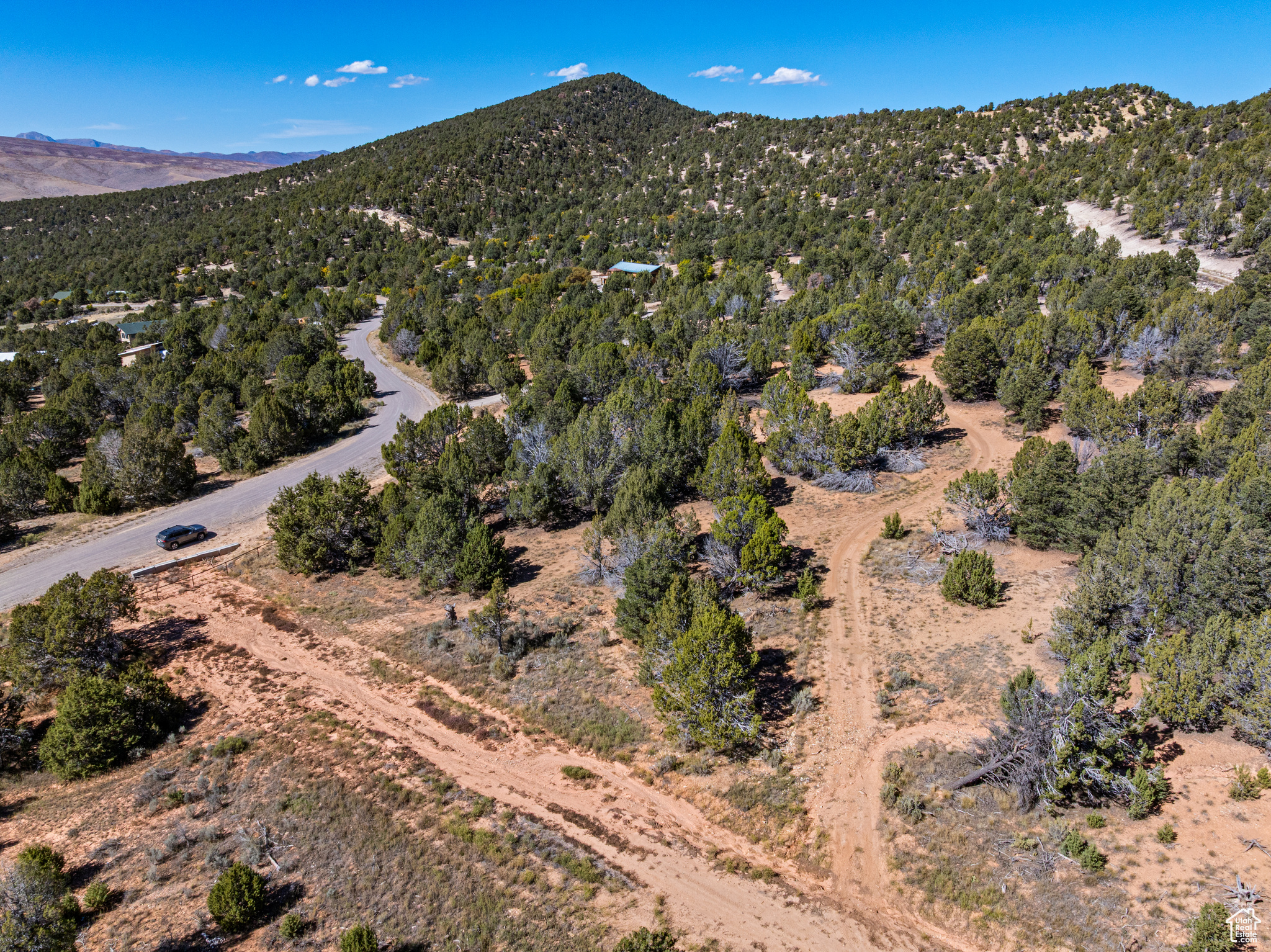 5.8-acre forested lot in Blackhawk Mountain Estates. Access to 1.2M acres of forest land.  Swimming lake under construction. Seller financing available.  Community trails. Seller financing available.  New and upscale mountain community with quick highway access.  Road paving under construction from Highway in.  Live. Play. Escape.  Information provided is deemed reliable, but should be independently verified by any interested party.