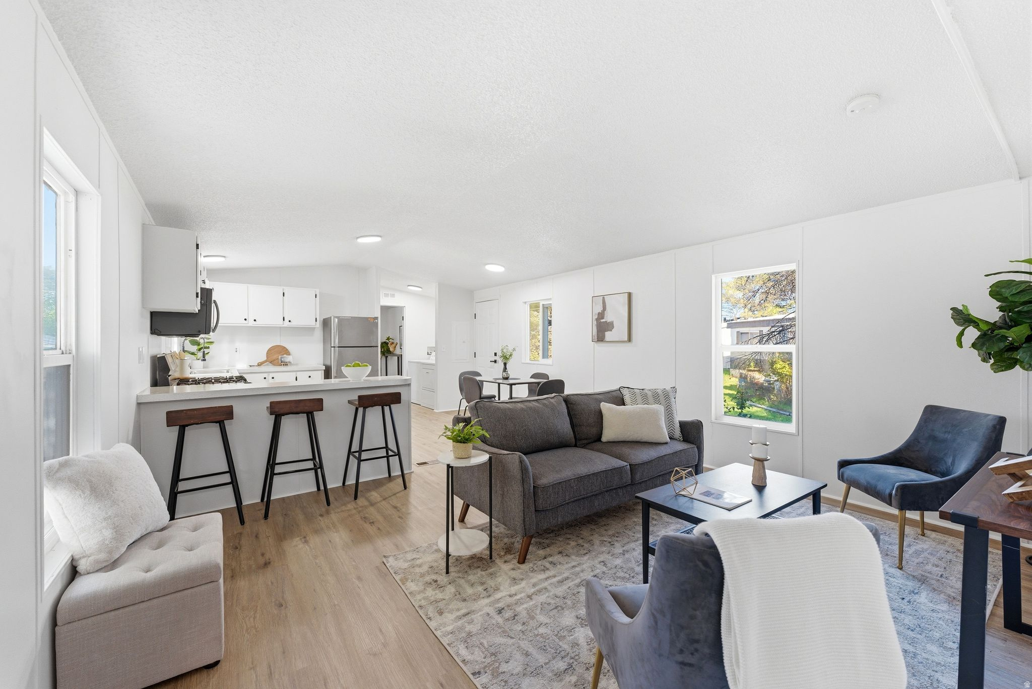 June Lot Rent paid for by the seller with accepted full price offer! Outstanding location, centrally located and close to everything. Don't miss 1675 Indian Summer Dr. If you've been looking for a great move-in-ready, updated unit in a 55+ community with great amenities and an outstanding price, you need to see this one. Three bedrooms and two updated bathrooms, one allows you to soak in the oversized tub, while the other offers additional convenience with a newly updated step-in shower. New LVP Flooring, a newer A/C Unit, updated appliances - including a gas range- are all included. Come and see it and make it your own. Walking distance to the community clubhouse and pool, life here can be simpler and more enjoyable. Schedule your showing today!