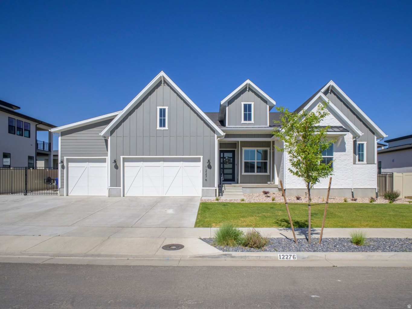 This stunning rambler is the perfect blend of modern luxury, effortless living, and unbeatable location in one of Herriman's most desirable neighborhoods in Herriman. Designed for convenient main-level living, this home features gourmet kitchen that opens directly to a covered deck perfect for year-round entertaining or hosting unforgettable summer barbecues while staying protected from the element, rich hardwood floors, three bedrooms, three bathrooms, and a spacious primary suite complete with a large walk-in closet. The open layout is ideal for everyday living and entertaining alike. The fully finished basement expands the home's versatility with two additional bedrooms, two bathrooms, a spacious family room, and abundant storage. Step outside to a backyard designed for entertaining, featuring a concrete patio with a pergola, storage shed, and dedicated RV parking. Conveniently located near parks, schools, shopping, dining, and outdoor recreation, this exceptional home offers the space, comfort, and amenities you've been looking for.  Buyer/Buyer's agent to verify all info.