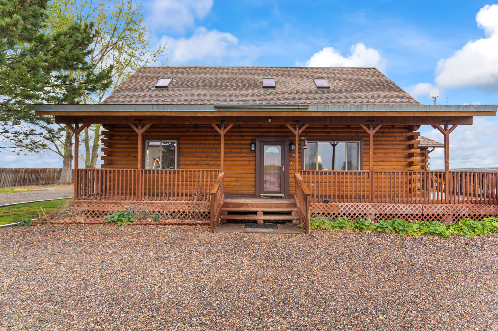 Tucked away on 8+ acres on the quiet outskirts of Richfield, this charming 1996 log home is the homesteader's dream you've been waiting for. With 2,086 sq ft of warm, character-rich living space, 3 bedrooms, 2 bathrooms, and thoughtful touches throughout, this property offers the perfect blend of rustic charm and comfortable country living. The main floor welcomes you with an open, inviting layout featuring a cozy fireplace, functional kitchen, and easy flow between living and dining spaces. Upstairs, a private bedroom and bath provide a quiet retreat. Step outside to a covered deck and open patio - ideal for morning coffee, evening sunsets, and soaking in the sweeping valley and mountain views this land delivers in every direction. With over 8 acres of usable ground, there's room to roam, raise animals, store all your toys and equipment, and still have space left over to build the life you've always envisioned. Whether you're dreaming of horses, a large garden, outbuildings, or simply elbow room - this property checks every box. All of this, just minutes from Richfield's shopping, dining, schools, and everyday conveniences. Properties like this don't come along often - come see it for yourself.