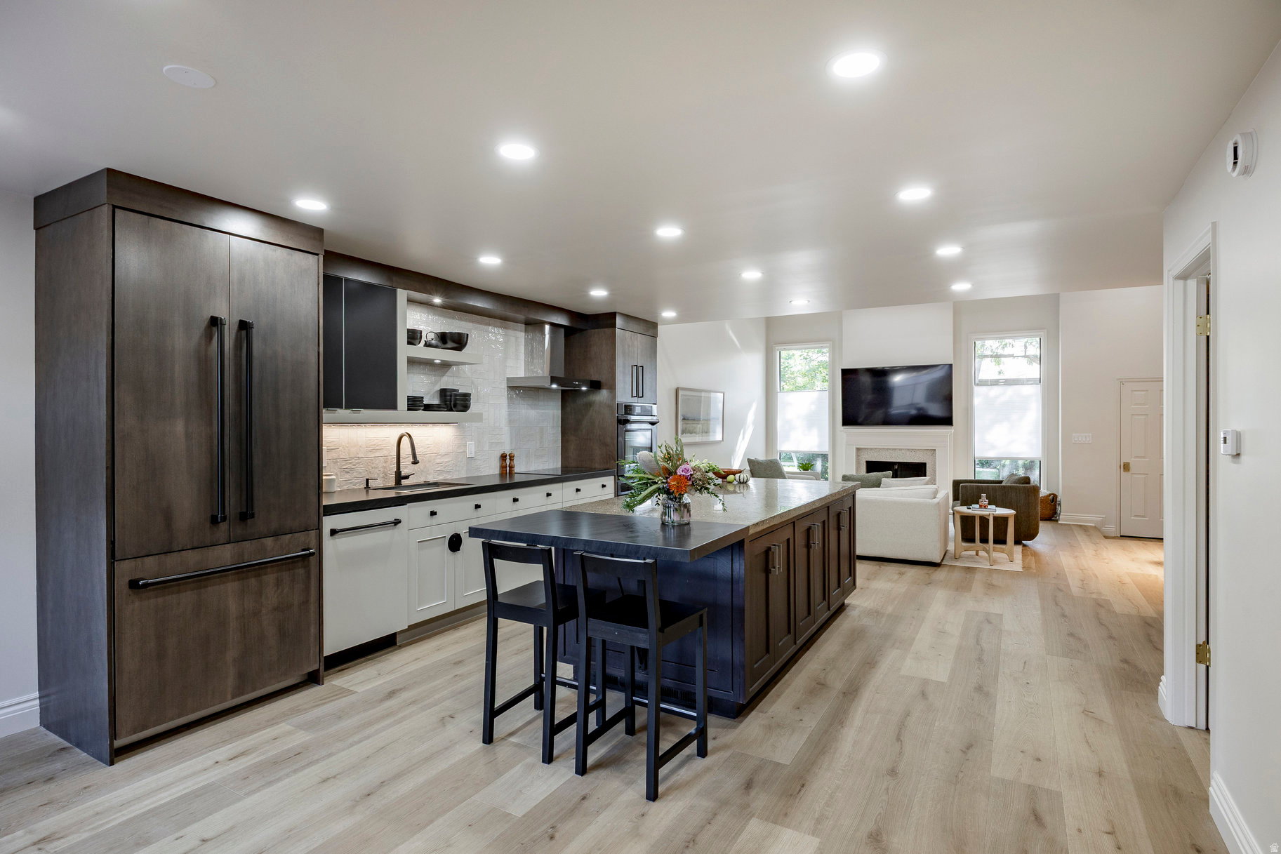 Every inch of this stunning Brookstone condo in Murray has been beautifully remodeled with style and attention to detail! Step inside and immediately notice the bright, open layout and the sophisticated updates that make this condo stand out. Elegant gold fixtures accent every room, complementing the fresh paint, new carpet, and warm finishes. The spacious main-level features a comfortable living area that flows seamlessly into the open kitchen that boasts new Z-Line appliances, sleek cabinetry, and generous counter space. The master suite on the main floor has a new laundry, in addition to a second laundry area downstairs for added flexibility. The lower level has its own walkout entrance directly into the garage offering exceptional versatility for guests, extended family, or even rental potential. Every detail has been thoughtfully updated, right down to the epoxy-coated garage floor and abundant storage throughout the home. Brookstone is known for its peaceful, well-maintained atmosphere and excellent amenities, including a community pool, pickleball courts, and clubhouse. Best of all, this home is perfectly positioned away from the freeway, offering quiet comfort while still being close to shopping, restaurants, and everything Murray has to offer. This is truly a turnkey opportunity in one of Murray's most desirable communities-combining modern luxury, thoughtful design, and an unbeatable location.