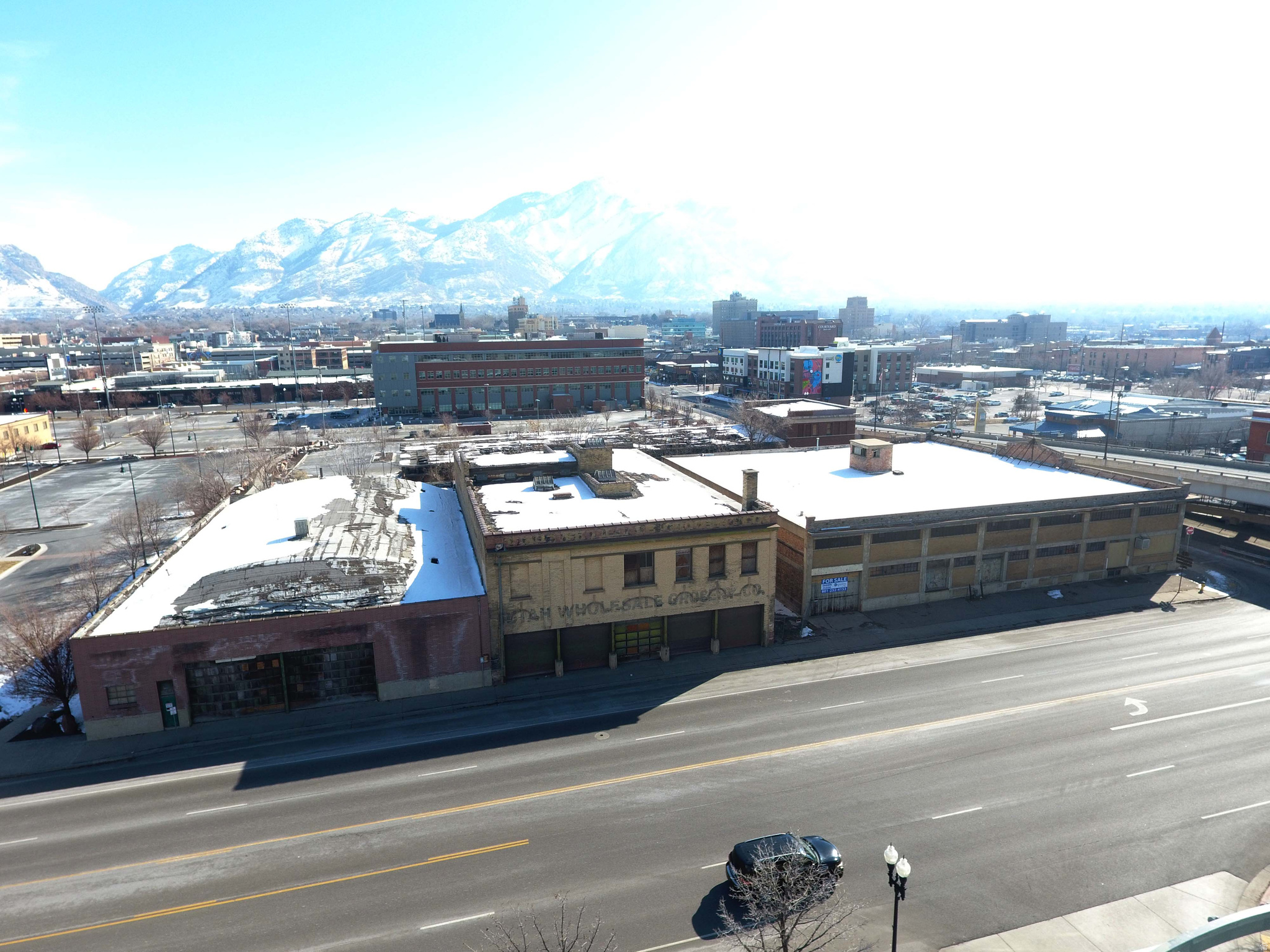 Includes all three buildings: Weber County Parcels 01-030-0006, 01-030- 0007 and 01-030-0008.  Extraordinary downtown Ogden location!  These three centrally located Ogden buildings are in a prime location sitting directly across the street for the Frontrunner Ogden Central Station offering tremendous commuting options. Right in the heart of Ogden the property is within walking distance of numerous restaurants, shops and activities that Ogden has to offer. Historic 25th Street (one block south), Lindquist Field (one block east) and the Junction (two blocks east). Visibility is extremely high for the property with an average daily traffic count of 25,000 vehicles on Wall Ave and offers easy access from anywhere in Ogden. Conveniently off the I-15 freeway on 24th Street the building is only 35 min from Downtown Salt Lake City and SLC International Airport.  Building #1 (01-030-0006) The first building built in 1921 is an expansive 42,840 sqft in total. Exquisite cement posts, beams and floors are accented by brick exterior walls and steel windows throughout. The open 1st and 2nd floors offer 15,720 sqft of large open flexible space. This space is ideal for urban industrial designed office space, loft apartments or a mixture of both. The 11,400 sqft basement allows for a lot of flexibility from extra workspace, warehouse space or a potential for parking utilizing the large access door directly from Wall Ave and an existing concrete ramp to the basement. All three floors are open layouts offering flexibility for use and or division of the space. Building #2 (01-030-0007) The second building is approximately 27,500 sqft in total. The brick exterior wall and interior wooden beams create a lot of character in this building. The main floor and upper floors are 9,506 sqft each and the basement is approximately 8,500. All sqft numbers are estimation and should be verified.  Building #3 (01-030-0008) is 10,560 sqft in total. Single story with free span beams creating one large open building with endless possibilities.  These amazing buildings are in the heart of Downtown Ogden is an opportunity that you do not want to miss out on. Downtown Ogden is developing and growing fast as people and businesses are starting to move further north from SLC. This is an exceptional opportunity for you to be a part of that growth.