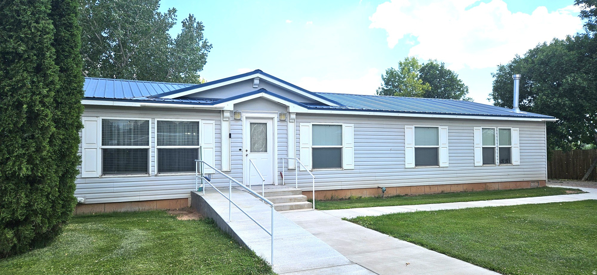 This spacious 4 BR, 2 bath home located in downtown Neola, UT. is sure to please those who thrive on small town charm. The fairgrounds are adjacent to the south, and a church is kitty corner. The .81-acre lot, complete with mature trees/shrubs and huge lawn, will provide you with solitude only mother nature can offer. Other key features include Ute Tribe water for keeping that yard green, and two fireplaces, one gas insert and a pellet stove, for keeping those winter nights at bay. Two sheds and a huge utility/laundry room will give you all the storage you need. Please give a 12-hour notice prior to showing. Also, sellers prefer that no pictures be taken. The sell of the home is contingent upon seller finding adequate housing. Buyer to verify all information on property.