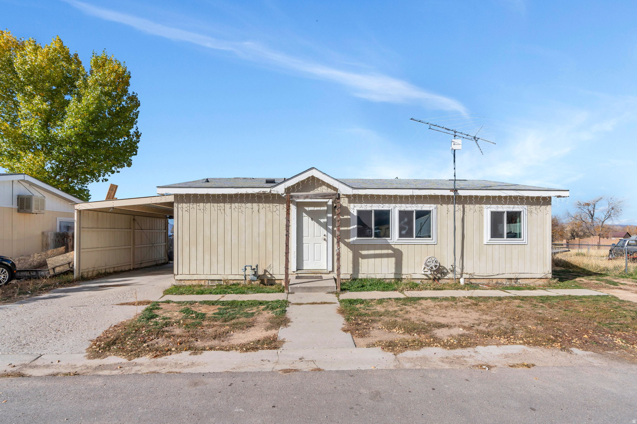 Affordable opportunity in the peaceful Aspen Village Community in Mt Pleasant. This well-laid-out manufactured home offers 3 bedrooms and 2 bathrooms. The primary bedroom includes an ensuite bathroom, while two additional bedrooms and a full bath are located on the opposite side of the home. A covered carport adds convenient off-street parking, and the home features a generous 34' crawl space, offering valuable extra storage. The large backyard provides room for outdoor enjoyment, gardening, or additional storage options. Conveniently located in Mt Pleasant with easy access to US-89, local parks, and outdoor recreation. Measurements provided as a courtesy only, buyer to verify all info.