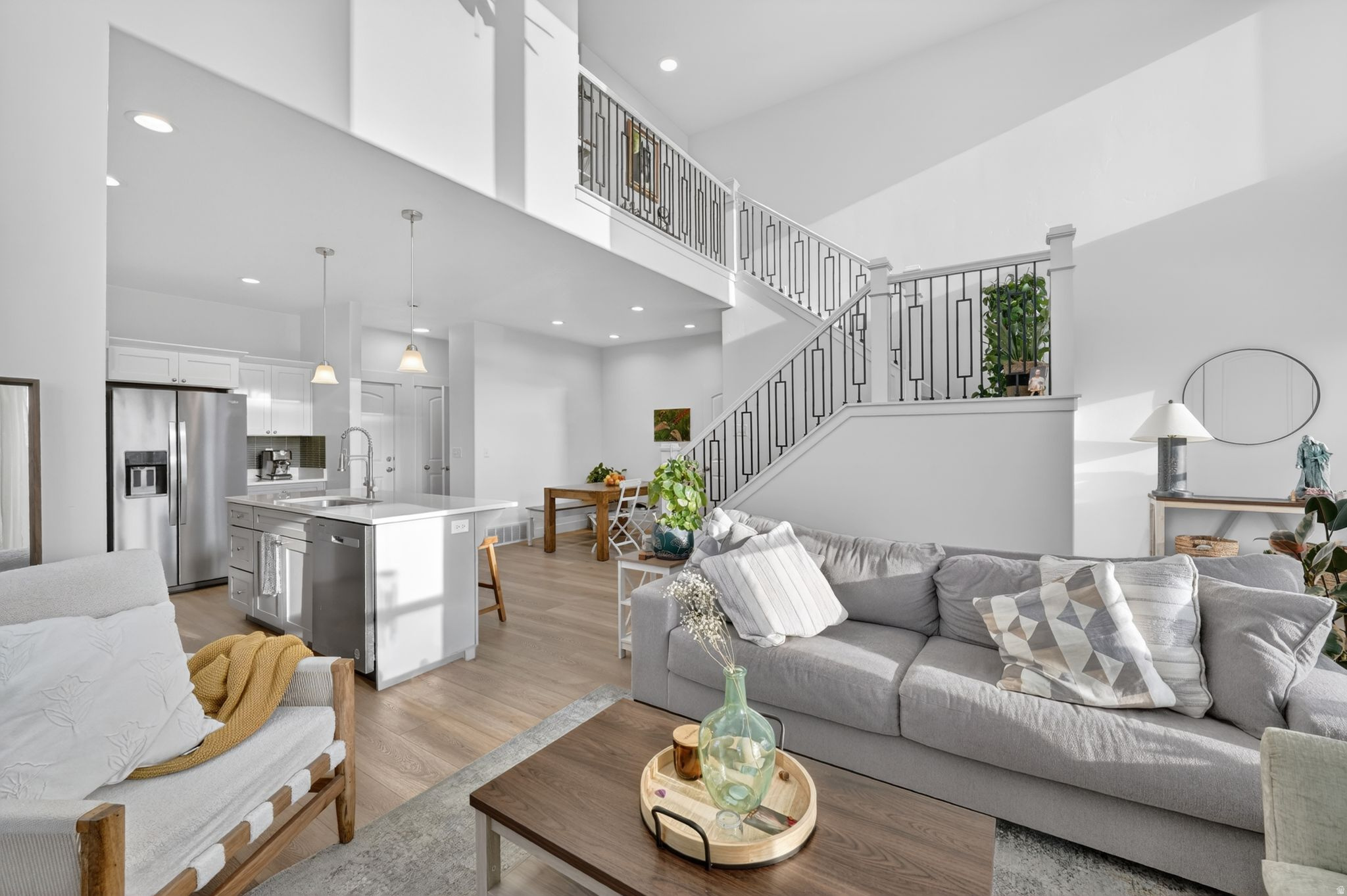 OPEN HOUSE THIS SATURDAY FROM 10AM-1PM! Experience elevated living in this beautifully designed, nearly new residence located in one of Herriman's most sought-after master-planned communities. Thoughtfully crafted with contemporary style, spacious interiors, and quality finishes throughout, this exceptional home offers the perfect blend of luxury, comfort, and convenience. The open-concept main level features expansive living and dining spaces filled with natural light, seamlessly connected to a stunning kitchen complete with sleek cabinetry, stone countertops, stainless appliances, and generous prep space ideal for entertaining. Upstairs, retreat to a spacious primary suite with spa-inspired bath and walk-in closet, while additional bedrooms provide versatility for guests, office space, or growing households. Enjoy the benefits of low-maintenance living with access to premier community amenities including pool, clubhouse, fitness center, parks, playgrounds, and scenic walking trails. Conveniently located near Mountain View Corridor, top-rated schools, shopping, dining, and outdoor recreation. A rare opportunity to own a stylish turnkey home in one of Herriman's premier neighborhoods.  Square footage figures are provided as a courtesy estimate only and were obtained from builder. Buyer is advised to obtain an independent measurement. All information provided is deemed reliable but is not guaranteed and should be independently verified by buyer and Buyer's agent.
