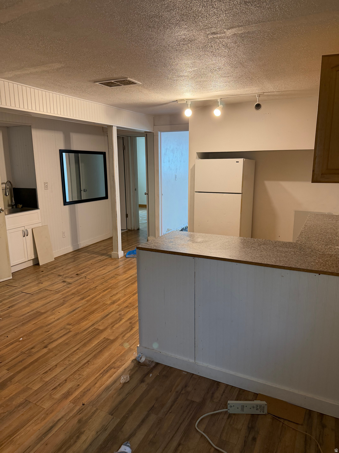 5 beds, 2 baths, 2 kitchens. Seller financing available with one hundred thousand down. Perfect starter home or flip opportunity. Opportunity awaits with this single-family home conveniently located just minutes from Bangerter Highway, offering easy access to shopping, dining, schools, and commuting routes. This property is full of potential and ready for your personal touch. With a spacious layout, great bones, and a desirable location, this home is perfect for buyers looking to build equity or investors seeking their next project. Needs some TLC, but with a little vision and updating, this home could truly shine. Don't miss the chance to make it your own!  Seller financing available.  1% credit to be used towards closing costs when using preferred lender. This property has a SilverBack Home Warranty and can be transferred to the buyer at closing.
