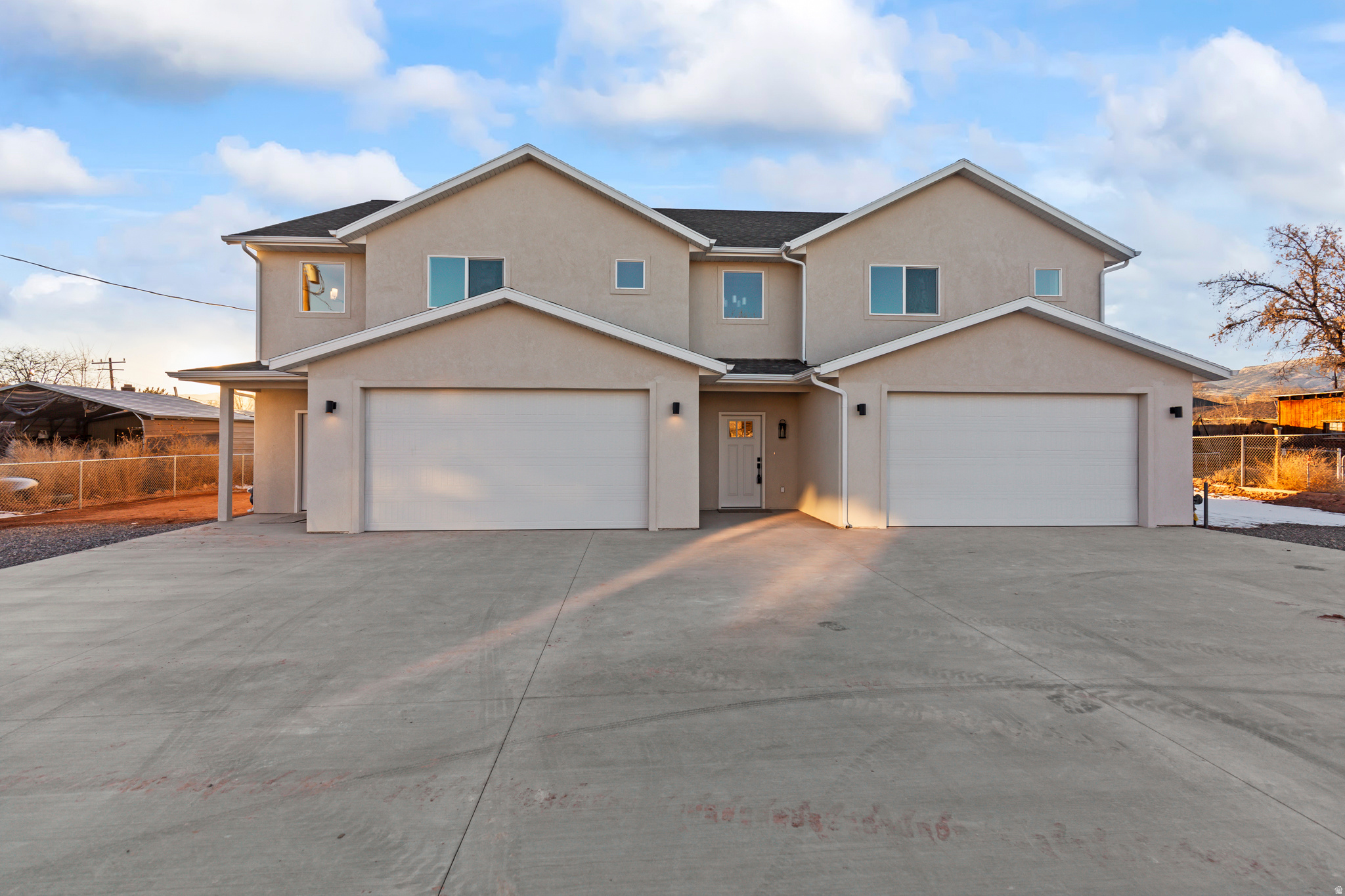 New construction duplex in the heart of Richfield. This property features two identical units, each offering 3 bedrooms, 2.5 bathrooms, and 2,199 sq ft of thoughtfully designed living space. Both units include an open-concept main floor filled with natural light, all bedrooms located upstairs, two full bathrooms, and an upstairs laundry room for added convenience.  Each unit is equipped with a 2-car garage, modern finishes throughout, and access to a partially fenced backyard. Ideal for owner-occupants, investors, or multi-generational living. Centrally located near schools, parks, and shopping, this is a rare opportunity to own a brand-new, low-maintenance duplex in a prime Richfield location.