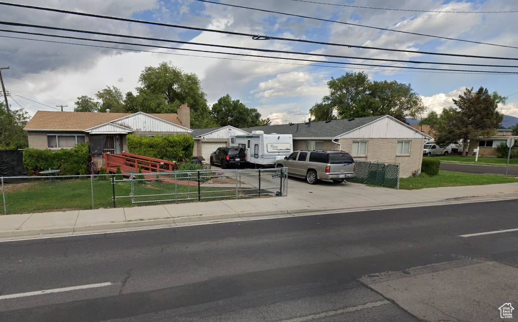 Unique Tri-plex in Prime Location! This is a solid home with garage and an attached duplex, with units each featuring 2 bedrooms, 1 bathroom, and open-concept living. Perfect for investors or owner-occupants. Located with easy access to schools, parks, and the freeway and TRAX.  Ample parking. Don't miss out on this versatile gem- Don't disturb tenants- offer contingent on inspection. Rents-  House $1500 Duplex $1200 & $1300