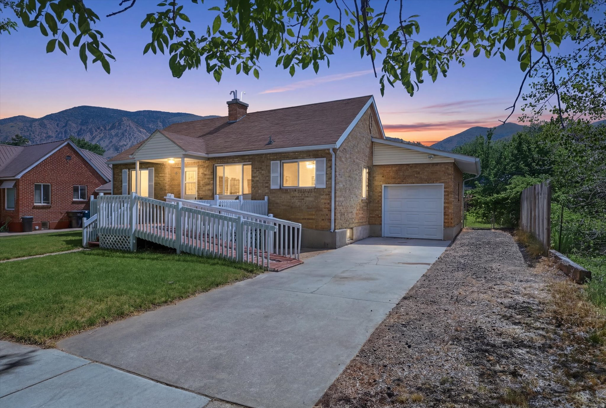 Welcome home to this charming 4-bedroom, 2-bathroom property in the heart of Brigham City! Offering a comfortable living space and a functional layout, this home features a cozy living area, an updated kitchen with a nice tile backsplash, and plenty of room for family and guests. The attached 1-car garage provides convenient parking and a 12x26 shed for extra storage. Fully fenced yard complete with sprinklers, fire pit, a chicken coop, and a ramped deck to the front door. Enjoy the benefits of a great location close to schools, parks, shopping, and local amenities. Whether you're a first-time homebuyer, looking to downsize, or searching for your next investment opportunity, this home is full of potential and ready for its next owner. Schedule your private showing today!
