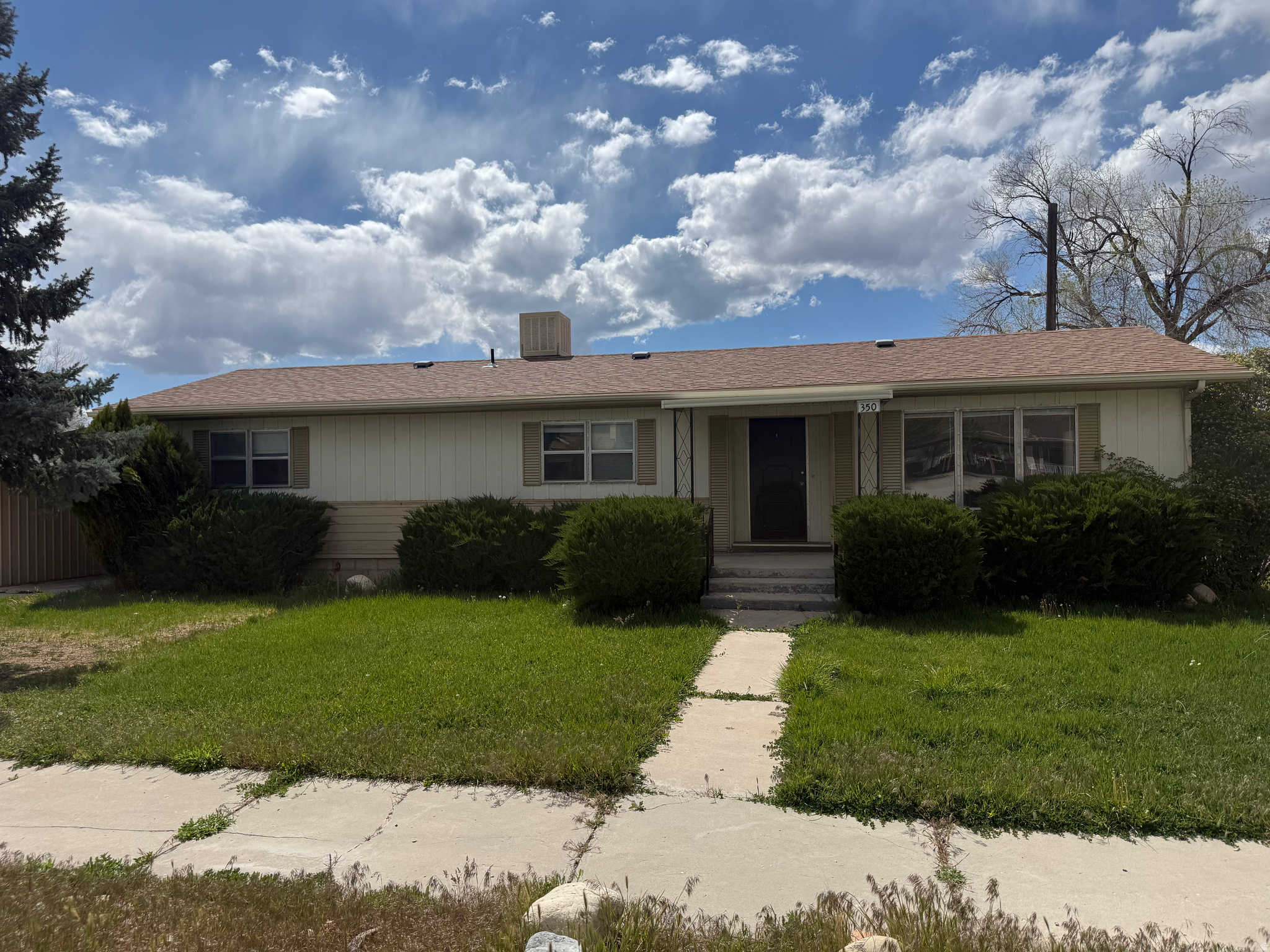 This is a great home that is affordable and has been updated fully. New custom cabinets in kitchen and main bath. New laminate flooring and carpet through out the entire home. The furnace and roof are new as well.  It is in a great neighborhood. This would be a great starter home or retirement home. Potential investment property as well. Schedule your showing today. Buyer and buyer's broker/agent to verify all information.  Square footage figures are provided as a courtesy estimate only and were obtained from county.  Buyer is advised to obtain an independent measurement.