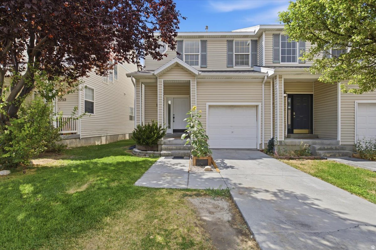Welcome to this spacious and well-designed 1,867-square-foot townhome, offering the perfect blend of comfort and functionality. The second floor features three generously sized bedrooms and a full bathroom.  The main level boasts a bright, open-concept kitchen and living room, creating an inviting space for everyday living and entertaining. You'll also enjoy the convenience of direct access to the attached one-car garage.  Downstairs, the finished basement expands your living space with a comfortable family room and a dedicated laundry area, offering flexibility for relaxing, working, or hosting guests.  Step outside to enjoy the backyard, complete with a patio and elevated deck with room for a grill-perfect for summer barbecues, outdoor dining, or simply unwinding after a long day.