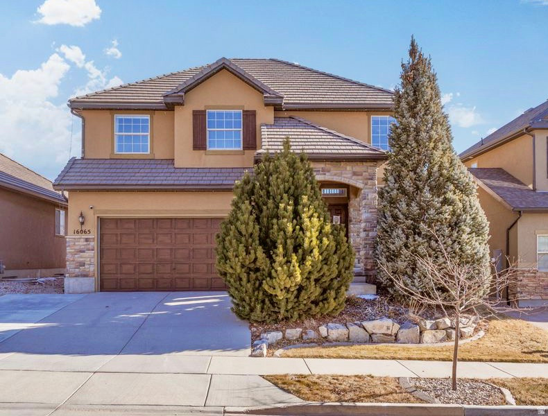 Quiet, elevated living above the inversion in Draper's SunCrest (Utah County side), with the fantastic HOA offerings (swimming pool with slide and lazy river, modern gym facilities, club house and community events), offering panoramic mountain views, blue-sky days, and a peaceful alpine feel just minutes from grocery stores, restaurants and Silicon Slopes. This move-in ready home features a durable 50-year tile roof, new LVP flooring throughout, and a fully landscaped, fenced yard with a Trex deck; perfect for relaxing or entertaining.  The unfinished basement offers room to grow and build equity, already plumbed for a fourth bathroom. Enjoy a true outdoor lifestyle with direct access to Corner Canyon's extensive trail system for hiking, biking, and open space off-leash dog areas. Home is currently covered and protected with a Fidelity National Home Warranty, and an additional year of coverage will be paid by the seller for added peace of mind. View video here: https://video.helloarti.com/video/87460.mp4  Square footage figures are provided as a courtesy estimate only and were obtained from County Records; buyer is advised to obtain an independent measurement.