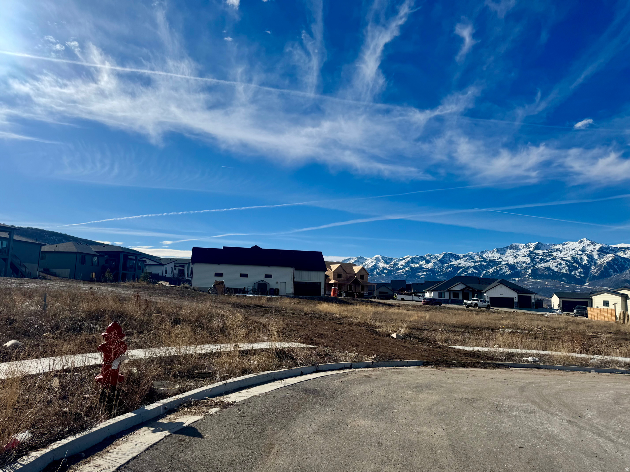 Welcome to one of the most coveted building sites in the Wasatch Back - a stunning double lot 0.62-acre perched at the top of a quiet cul-de-sac in the sought-after Mountain Green community. This is the kind of property that stops you in your tracks: sweeping, unobstructed mountain views greet you the moment you arrive, offering a dramatic backdrop that will define every single day of life here. Imagine waking up each morning to panoramic vistas, designing your dream home to frame the scenery just the way you've always envisioned. Cul-de-sac positioning means minimal traffic, maximum privacy, and a true sense of arrival every time you pull up, this is a lot that feels like the top of the world. Owner has finished plans for a custom home designed for this lot.