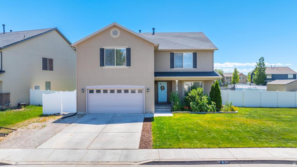 Bright, spacious 2 story home, with 5 beds on corner lot in wonderful community. Fantastic location, slap bang in between Saratoga Springs and Lehi. Fully fenced yard w/gate for easy access to school bus stop, park and walking trail. Pressurized Irrigation System is Wi-fi Enabled. Home is clean and very well cared for. Brand new roof, less than 1 year old. Plenty space in the oversized living room and kitchen for entertaining and relaxing. Floor and upstairs are on 2 separate HVAC systems. 5 large bedrooms, 2 with their own on suite.  Huge master bedroom and even larger master bath and closet! If you're looking for a clean unit, with room to grow in a fantastic location, then this is the one to view. Easy to show!