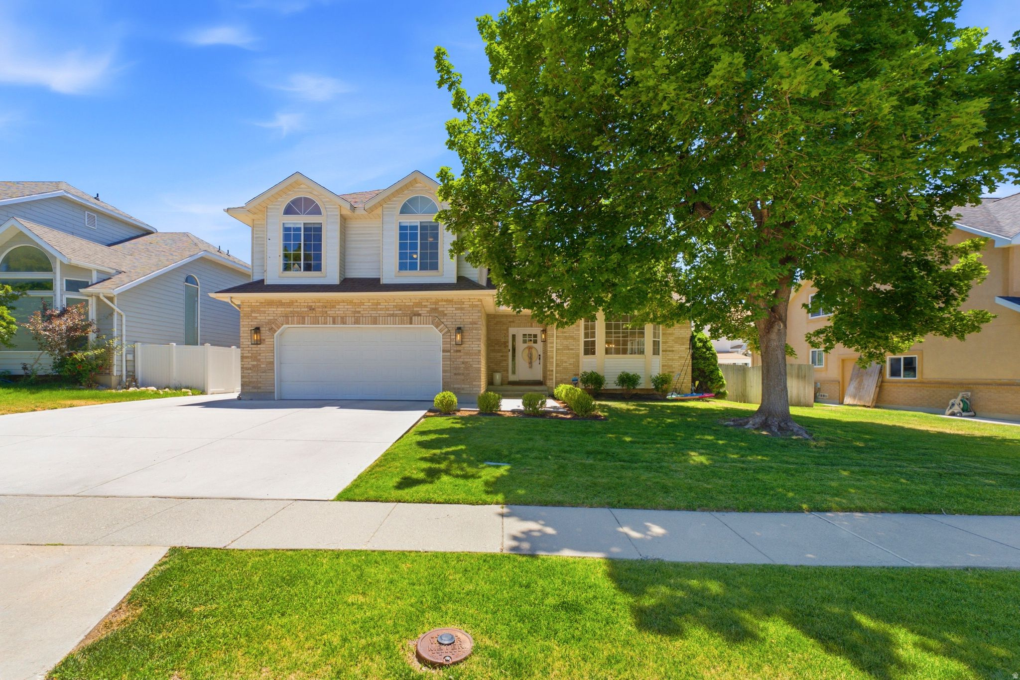 Enjoy coming home to this exceptional 6-bedroom, 4-bathroom home nestled in the heart of Alta Canyon Village. Offering over three levels of comfortable living space, this beautifully updated home combines modern finishes with a functional floor plan designed for everyday living and entertaining. The main floor features a stunning remodeled kitchen with white cabinetry, stainless steel appliances, porcelain countertops, a large breakfast bar, and beautiful wood flooring. You'll also find a formal living room, formal dining room, spacious family room with an electric fireplace, vaulted ceilings, main-floor laundry, and an abundance of natural light throughout. Upstairs, the spacious primary suite provides a relaxing retreat with a walk-in closet and a newly remodeled bathroom featuring dual vanities and a gorgeous walk-in shower. Three additional oversized bedrooms and a large loft/landing area offer plenty of room for family, guests, or a home office setup. The fully finished basement adds incredible flexibility with a second full kitchen, large family room, two bedrooms, laundry area, ample storage, and a separate entrance-making it ideal for multi-generational living, guests, or a potential mother-in-law apartment. Outside, enjoy a private, fully fenced backyard complete with a deck perfect for summer barbecues and entertaining. Additional highlights include RV parking, a spacious 2-car garage, and newer rear-facing windows. Ideally situated near parks, schools, shopping, dining, and recreation, with Big and Little Cottonwood Canyons just minutes away for world-class skiing, hiking, and biking. This is a rare opportunity to own a move-in-ready home in one of Sandy's most sought-after neighborhoods.** A must-see!  Square footage figures are provided as a courtesy estimate only.  Buyer is advised to obtain an independent measurement.