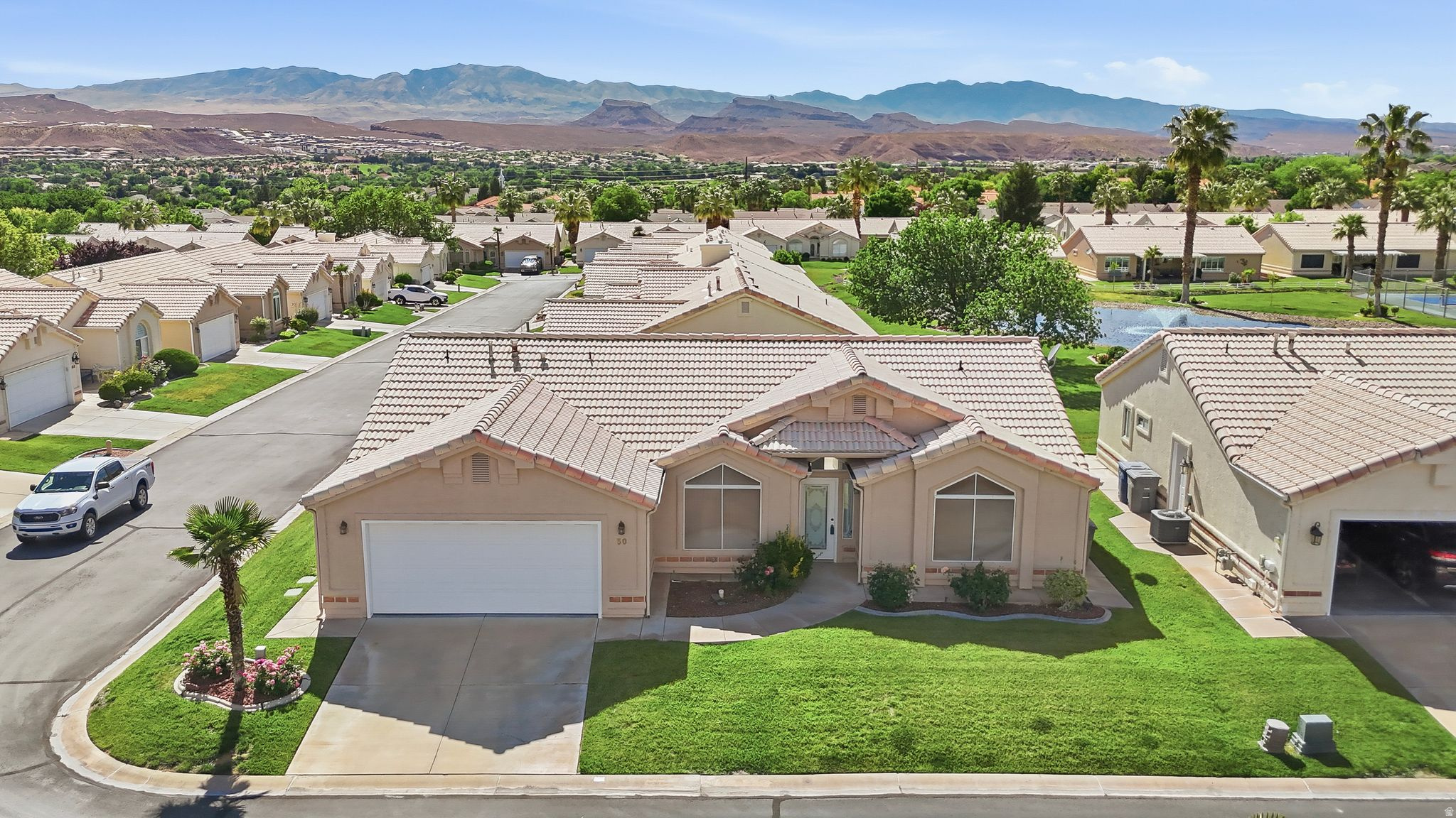 Welcome home to this well-maintained 3 bed, 2 bath home in a desirable 55+ community with views of the ponds and Red Mountain. Vaulted ceilings, natural light, and an open layout create an inviting feel. Enjoy a community pool plus close access to shopping, dining, golf, parks, and trails.